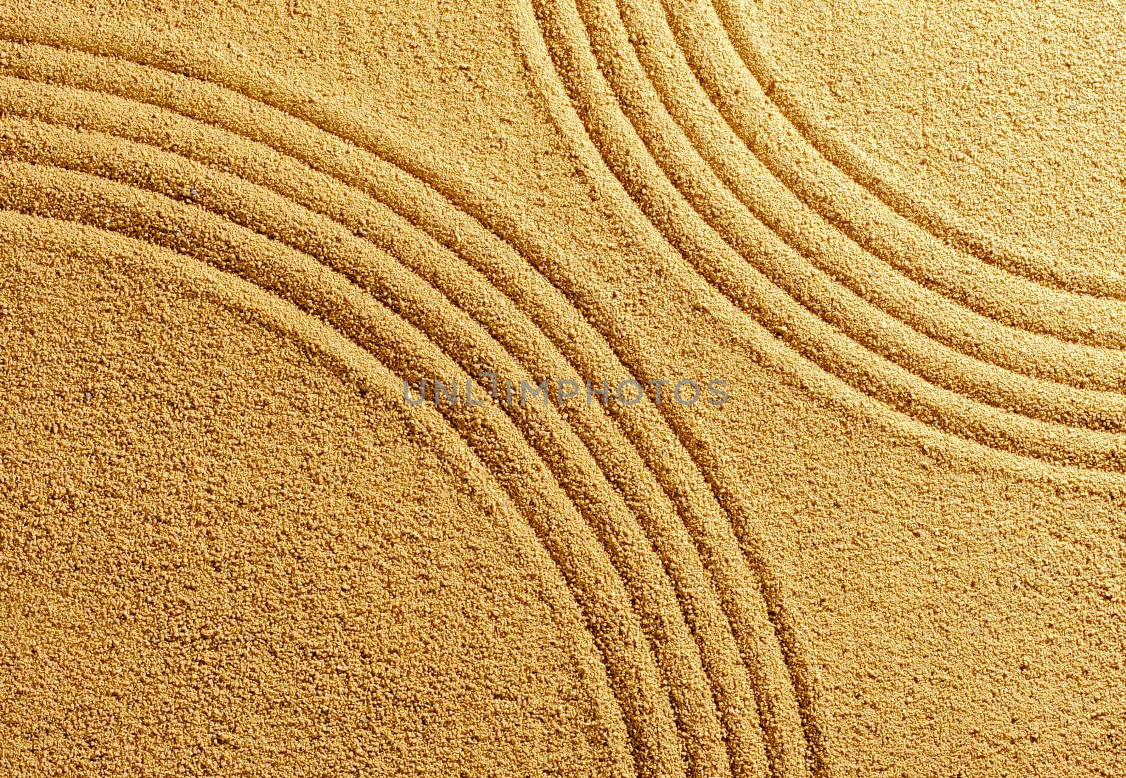 Two arcs on yellow sand background summer beach warmth for harmony and balance of spirit.
