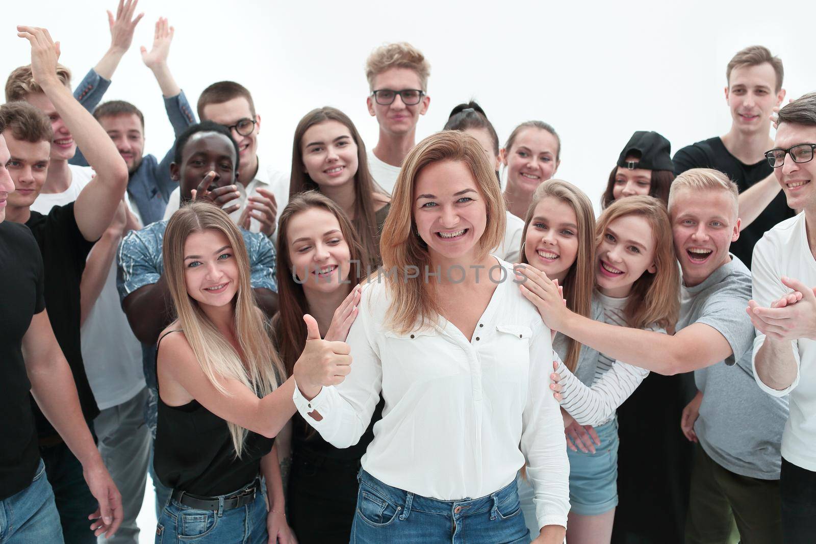 close up. very happy woman standing among her friends . isolated on white