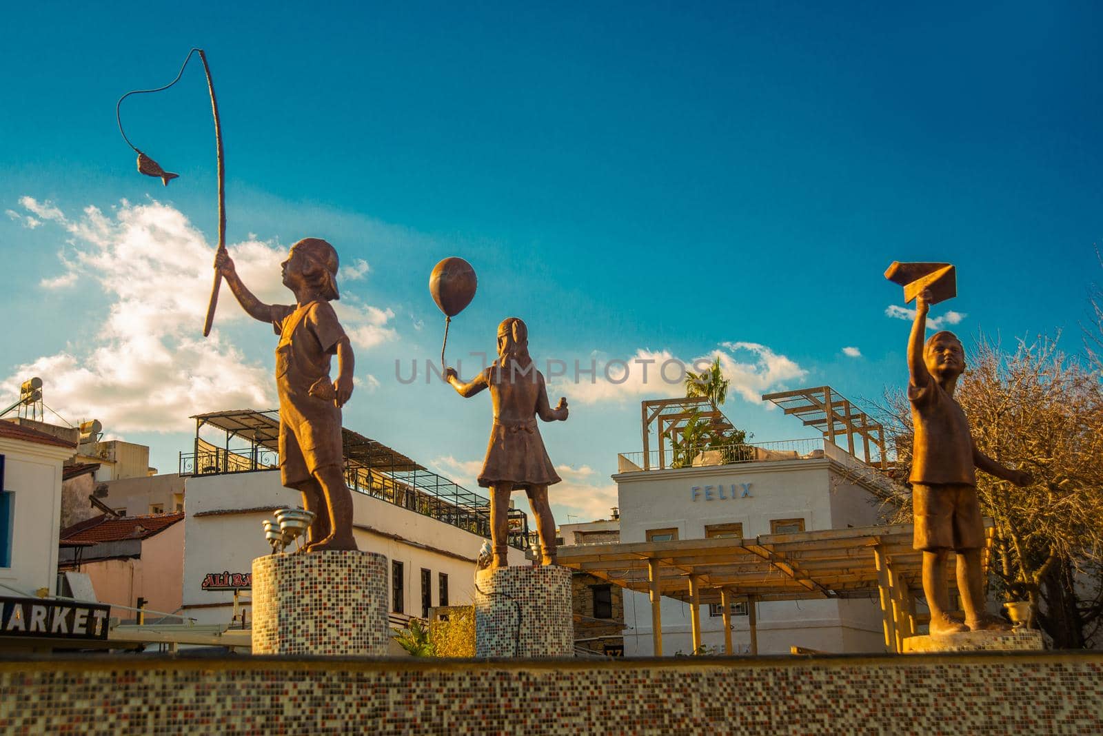 MARMARIS, MUGLA, TURKEY: Fountain with sculptures of Children in Marmaris. Statues of children playing.