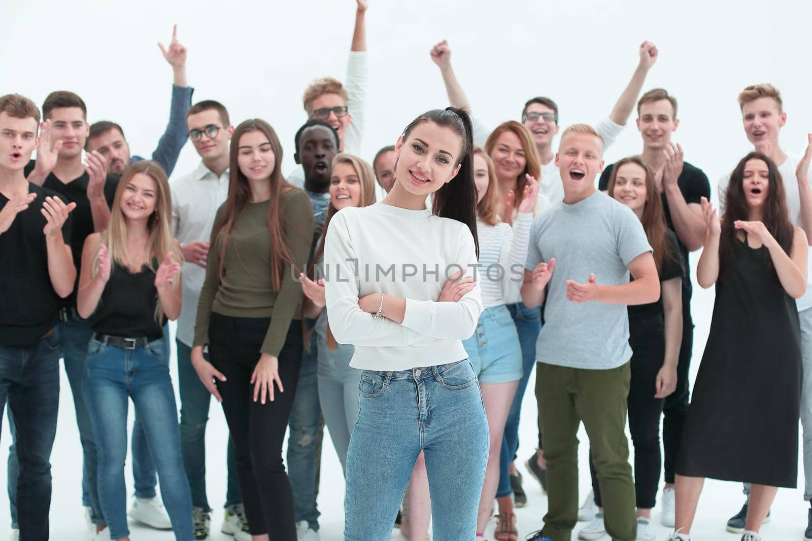 happy group leader standing in front of her team. isolated on white background