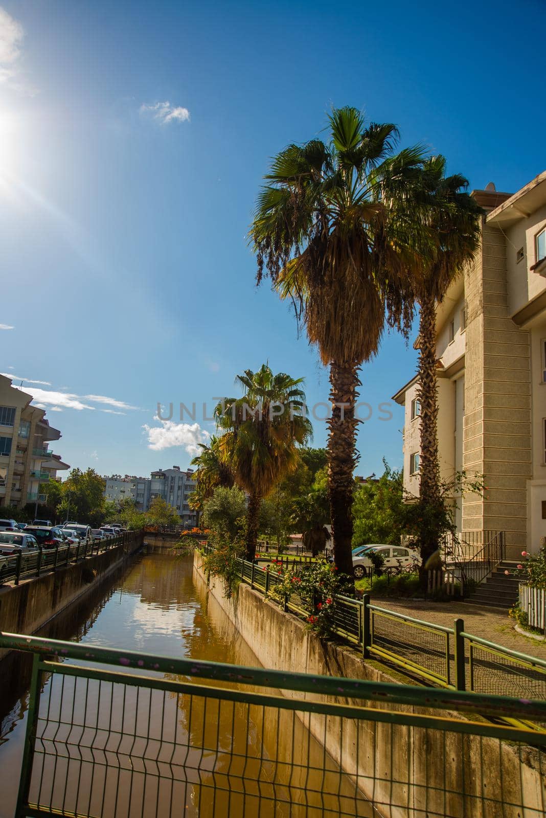 MARMARIS, TURKEY: Canal with water on the street of the city of Marmaris on a sunny day. by Artamonova