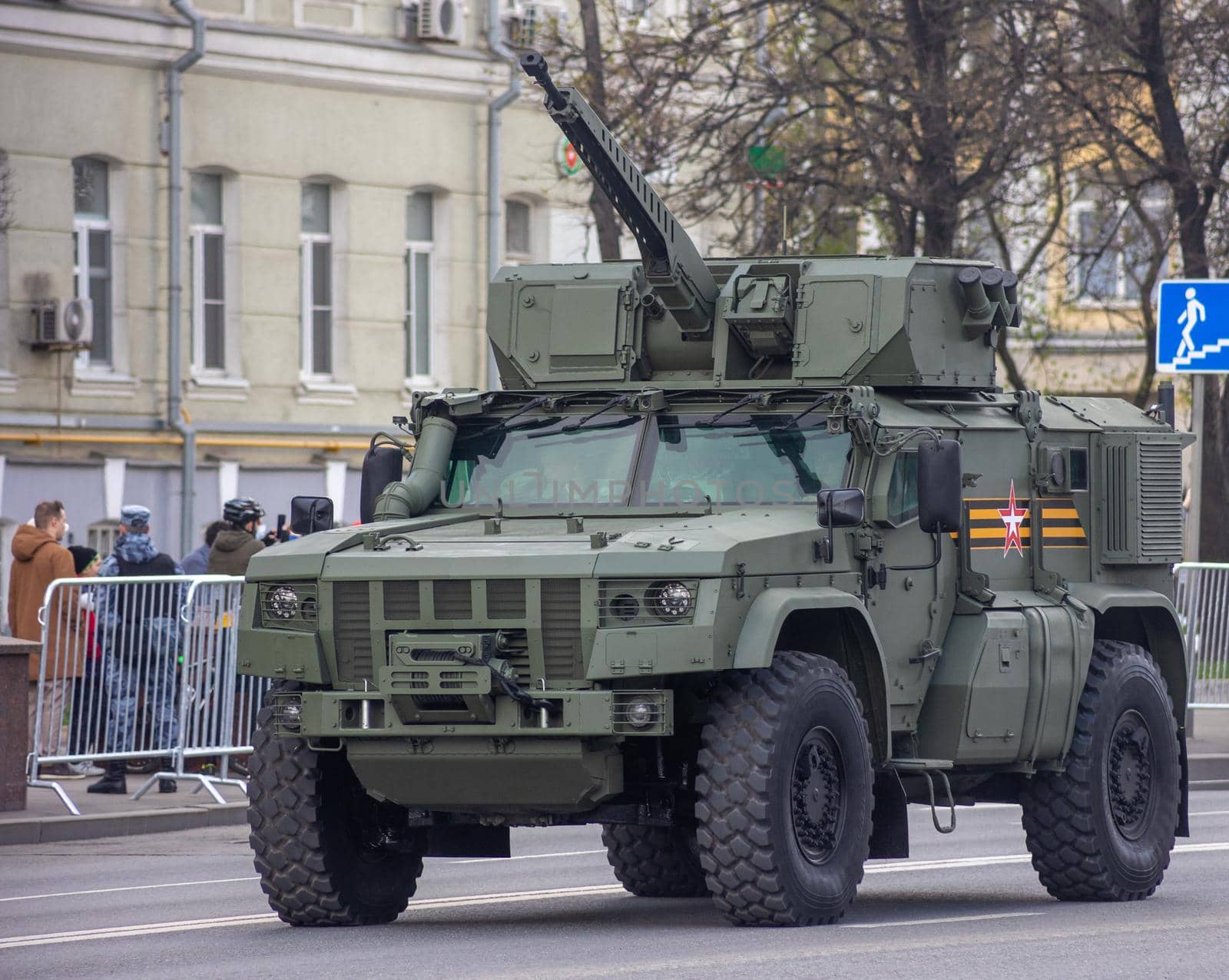Moscow Russia - may 09 2022: Victory Day parade. Russian military car the car is driving down the street of the city. High quality photo