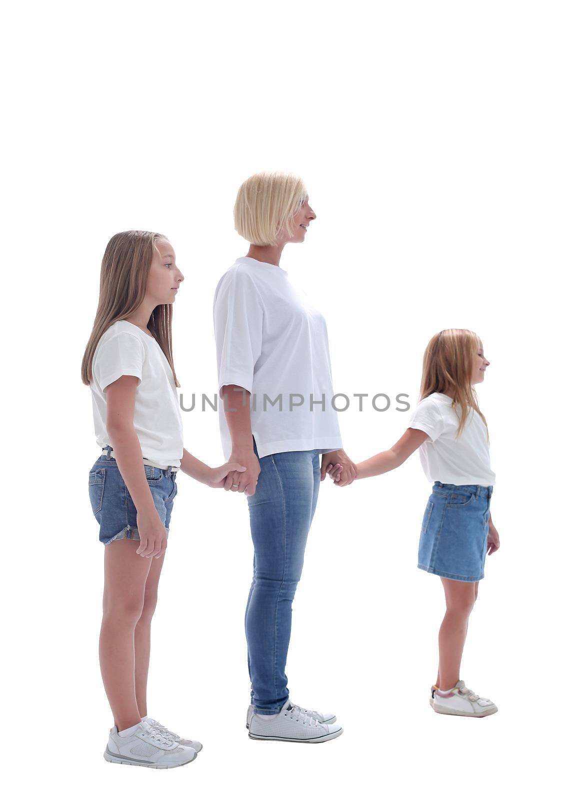 side view . mom and daughters going together. isolated on white background