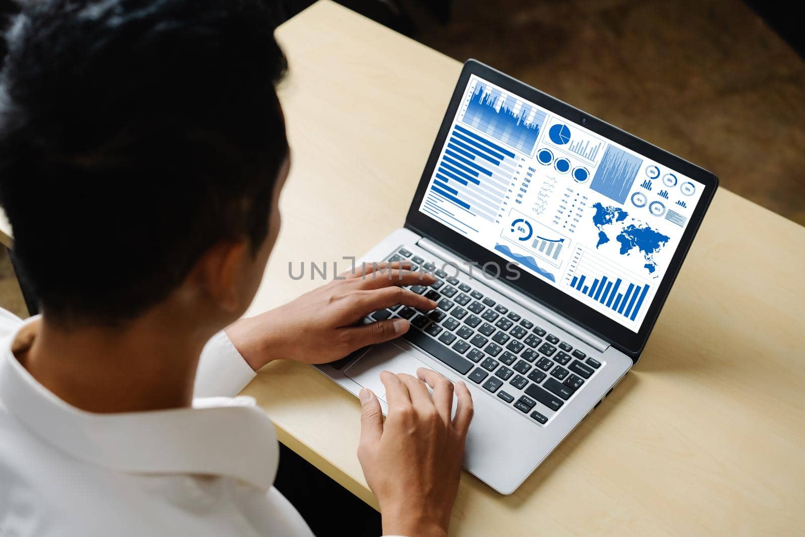 Business data dashboard analysis by ingenious computer software . Investment application display business sales and profit on the computer screen and advise marketing planning decision .