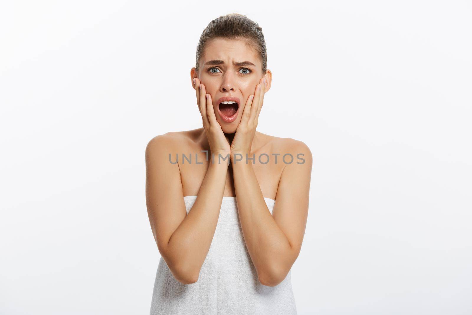 Beautiful woman in panic and serious looking at camera