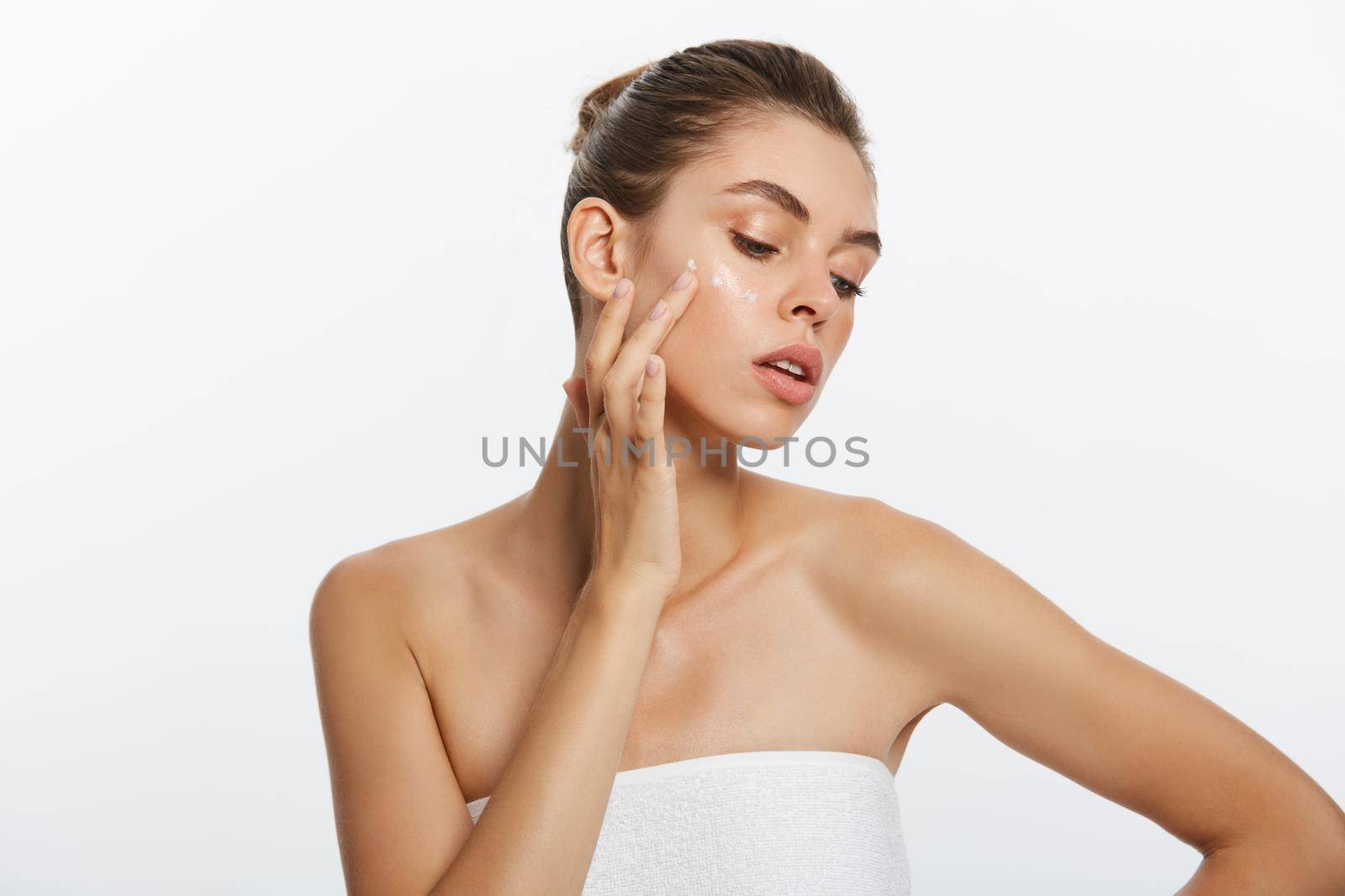 beauty girl of caucasian woman checks her skin, skin care, acne treatment.