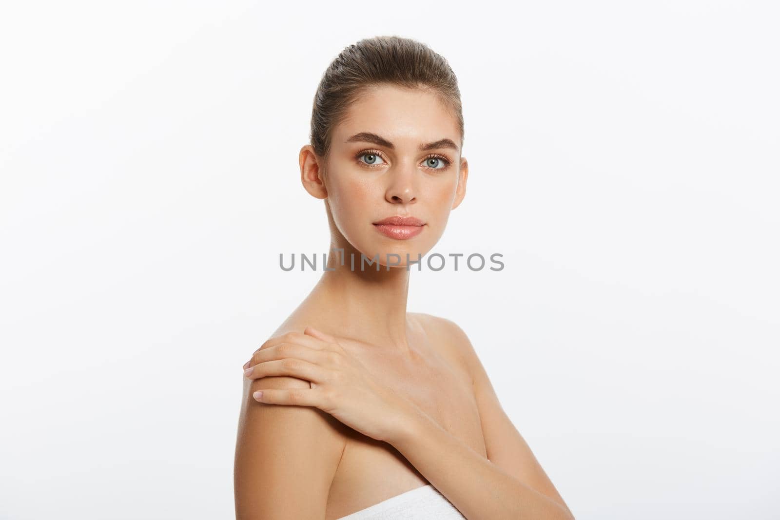 Youth and Skin Care Concept - Beauty Woman face Portrait. Beautiful model Girl with Perfect Fresh Clean Skin. Isolated on white background. by Benzoix