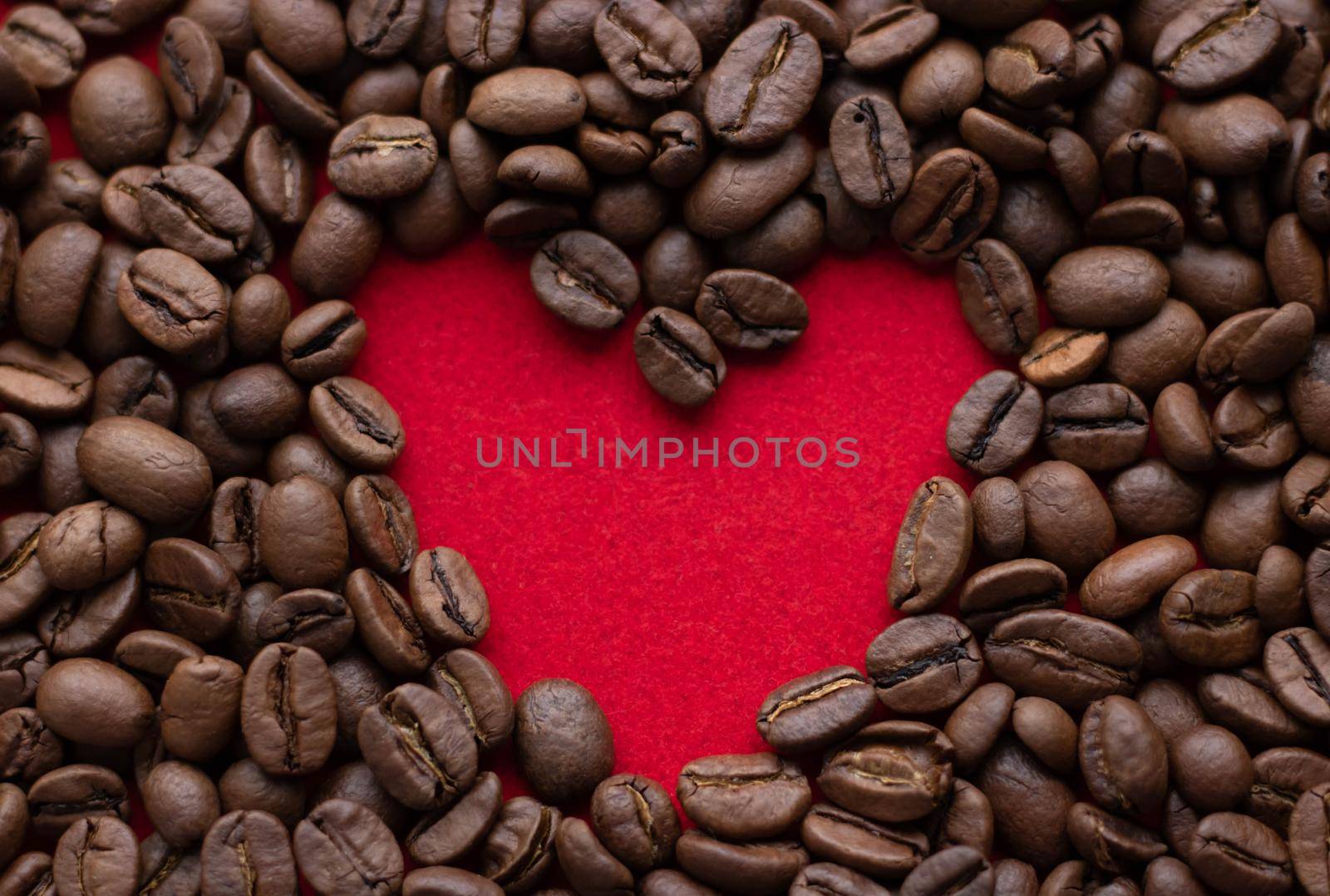 Creative concept photo of heart made of coffee on isolated background by lapushka62