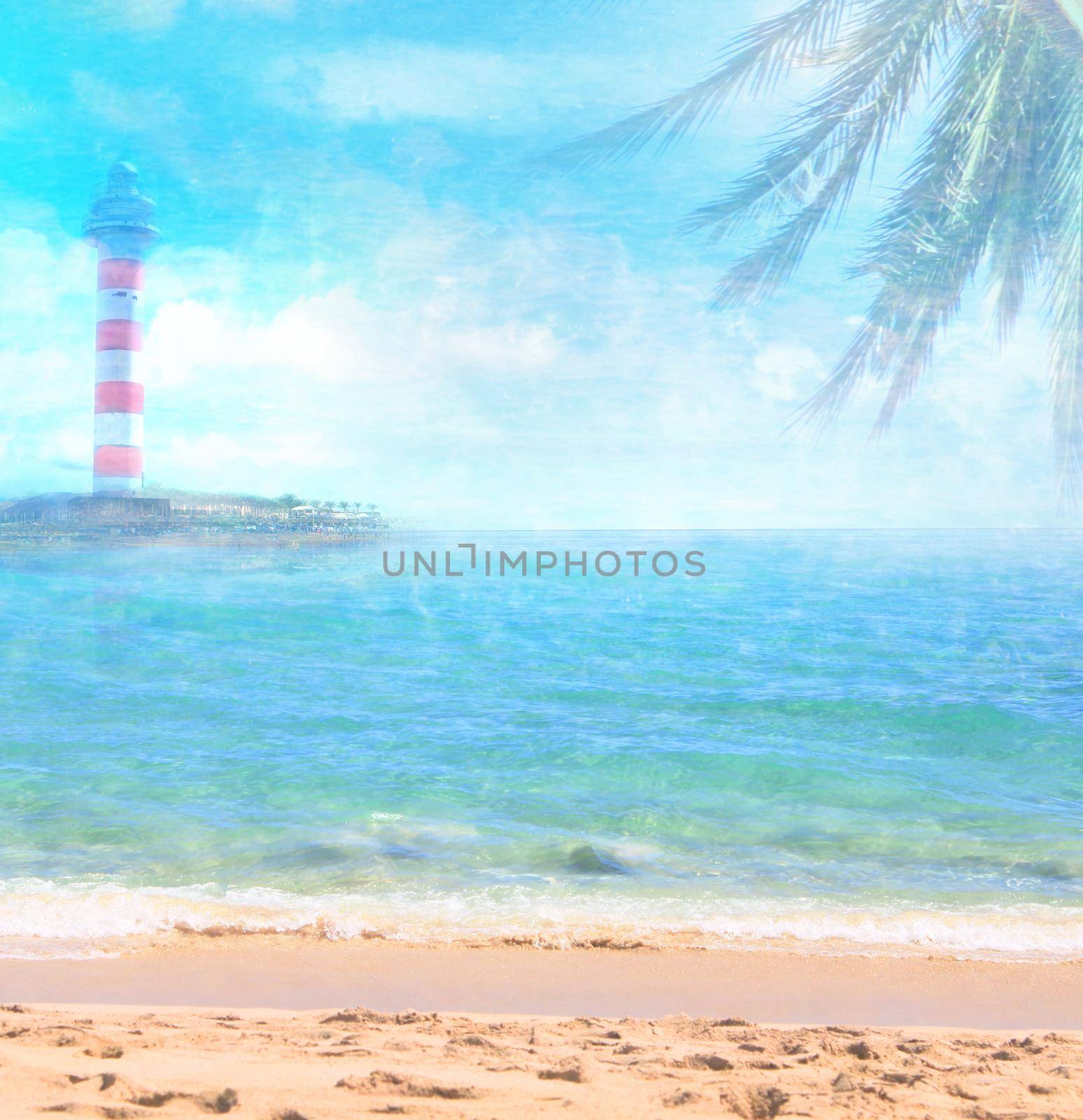 lighthouse seen from a tiny beach