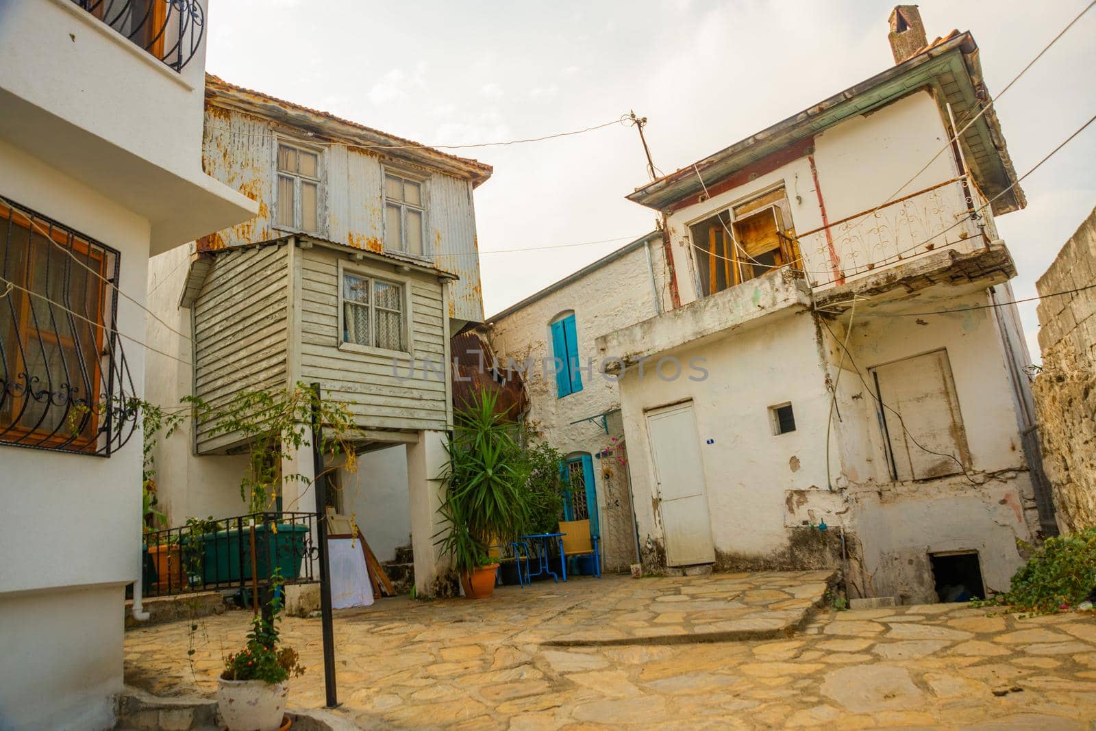 MARMARIS, MUGLA, TURKEY: Beautiful Streets of old Marmaris. Narrow streets with stairs among the houses with white brick, green plants and flowers in the old town of resort of in Turkey