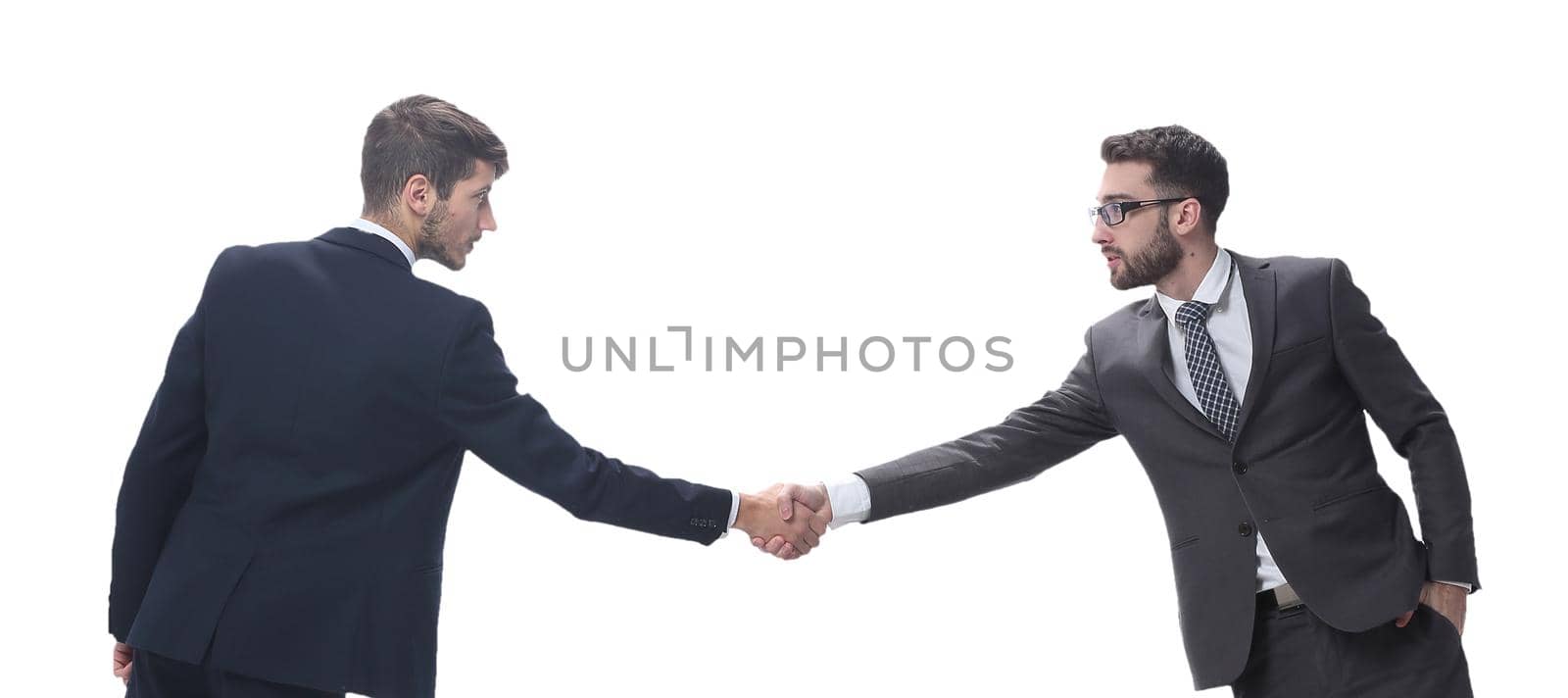 two business people shaking hands . isolated on white background