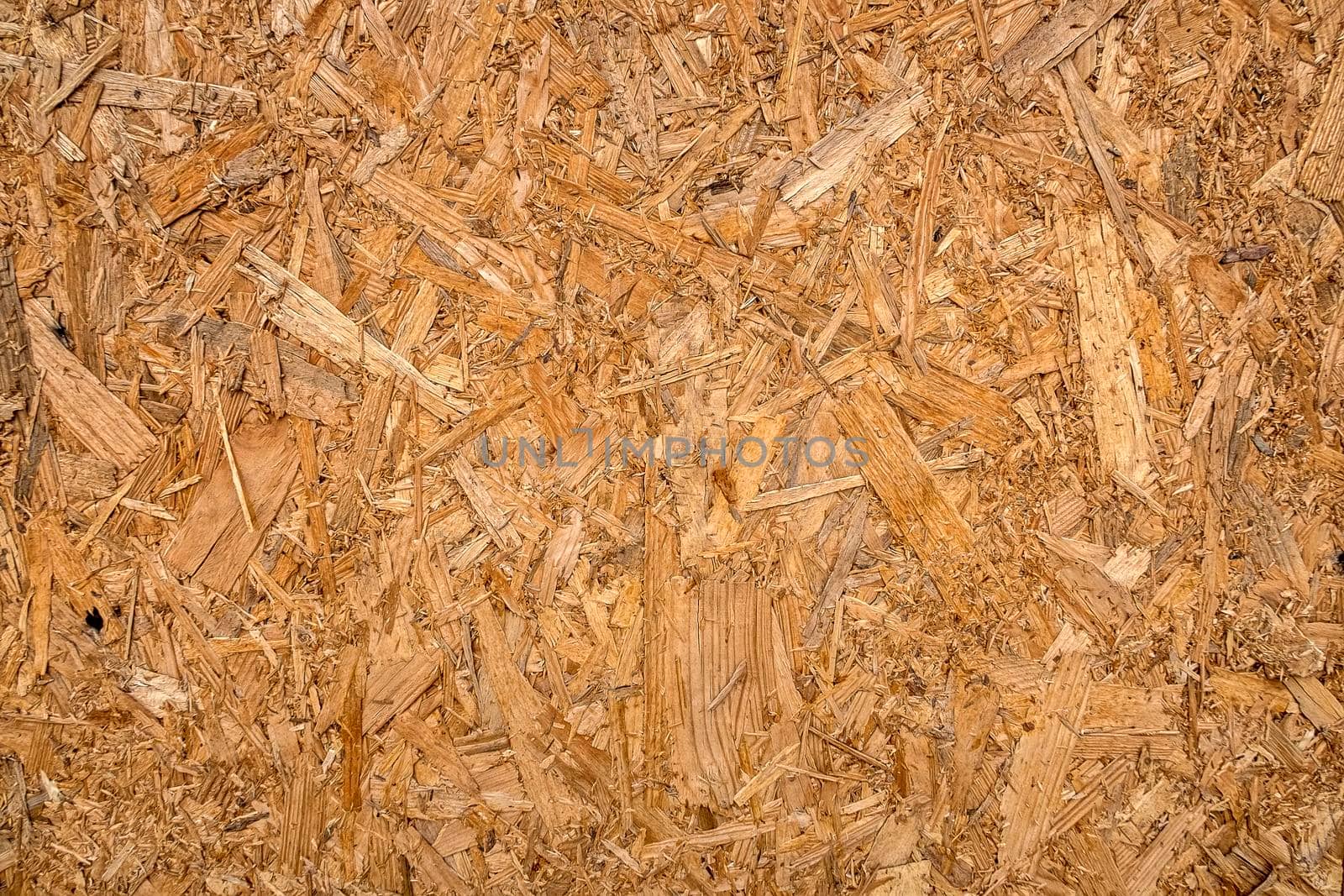 wooden texture of hardboard, fiberboard or particle board. Close up