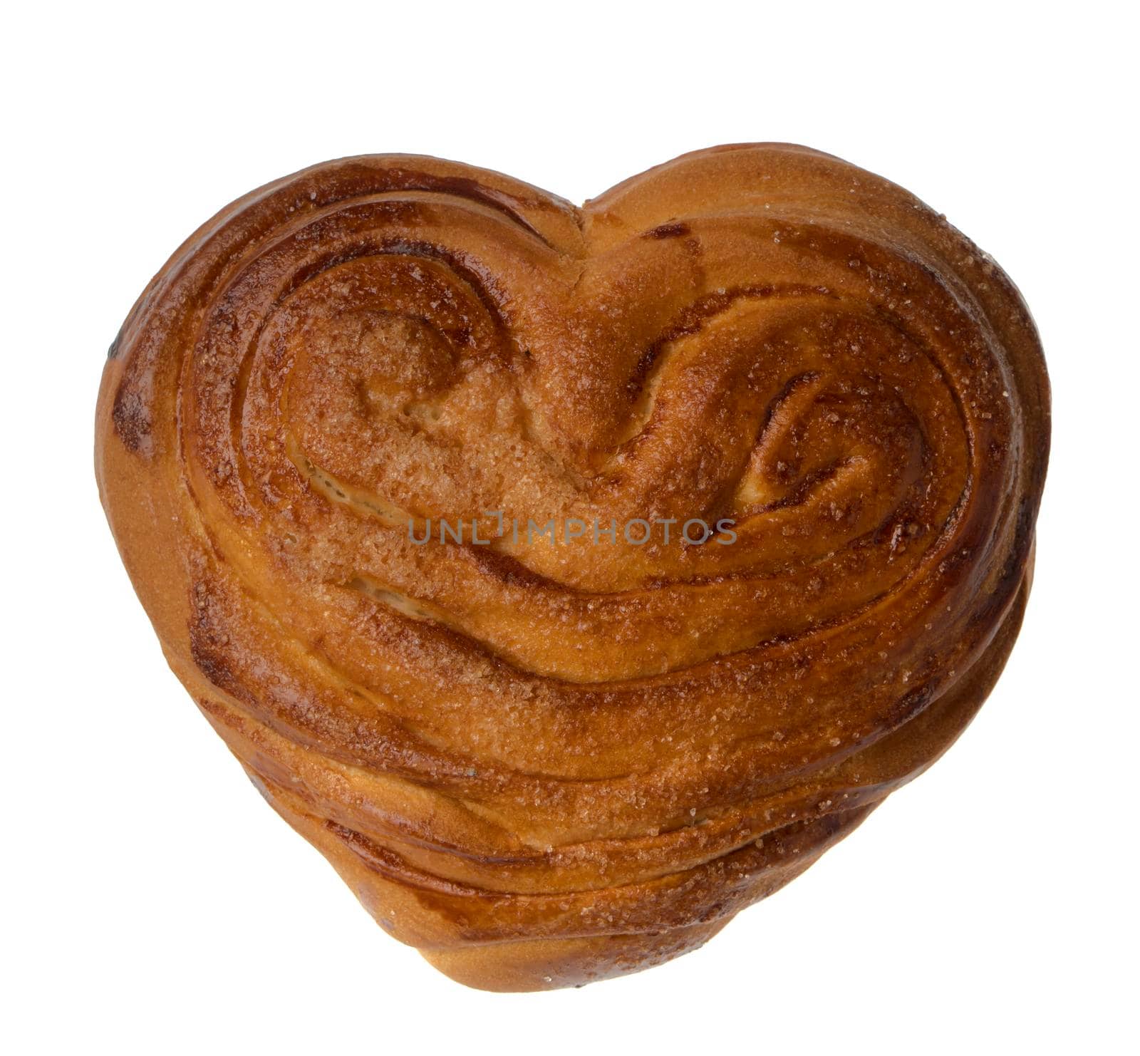 Appetizing baked bun ears on a white plate isolated