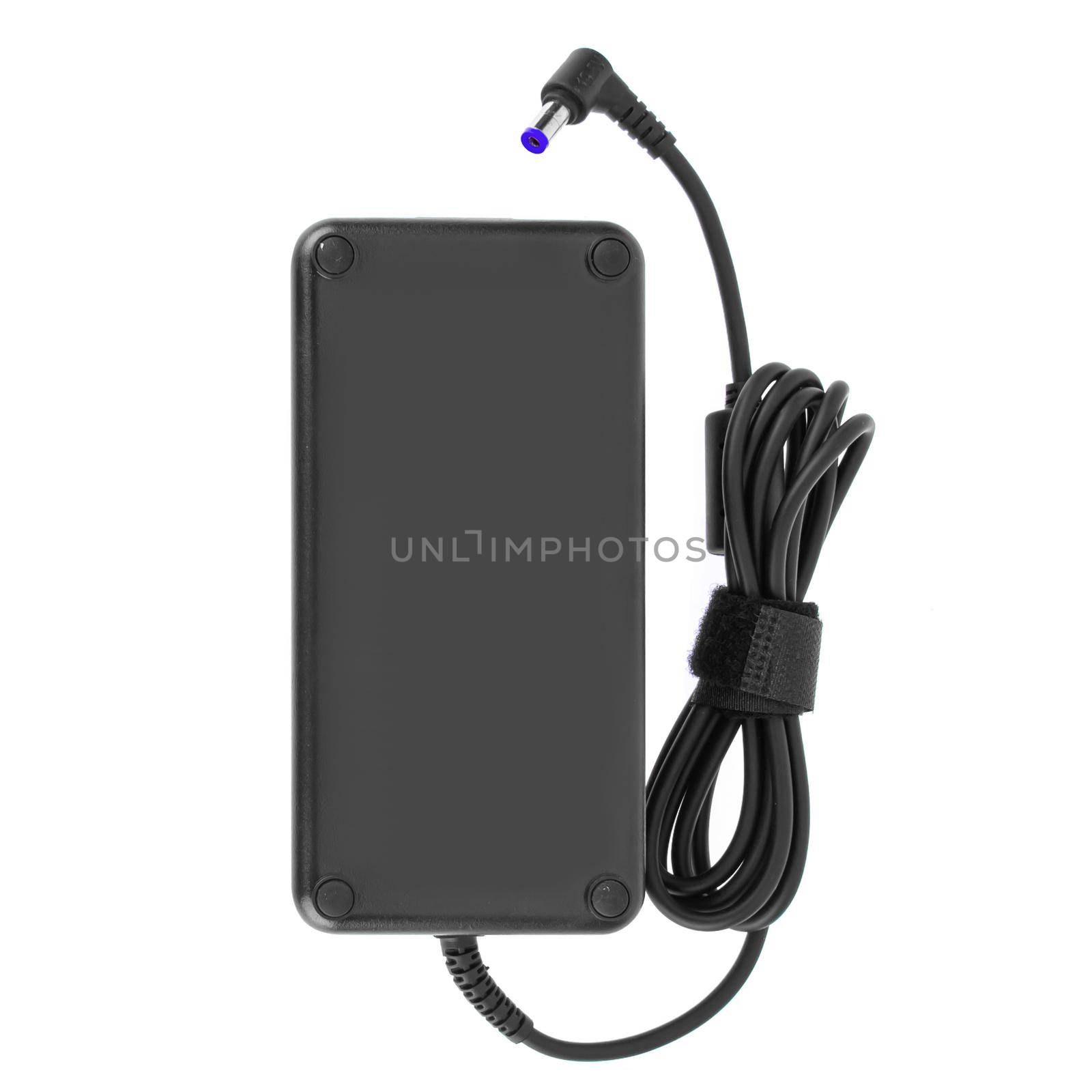 power adapter for a laptop, an accessory for a laptop, a spare for a computer, on a white background