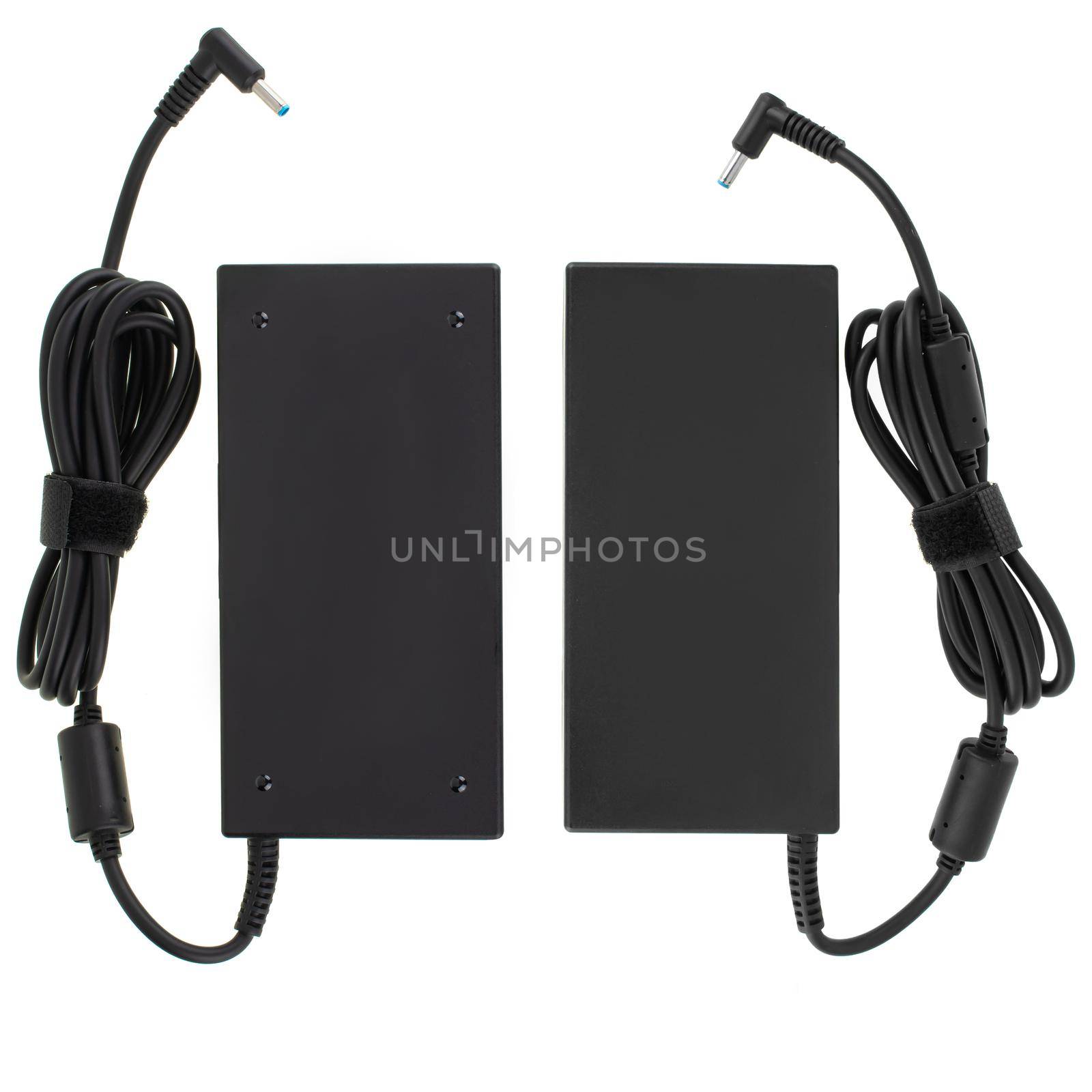 power adapter for a laptop, an accessory for a laptop, a spare for a computer, on a white background