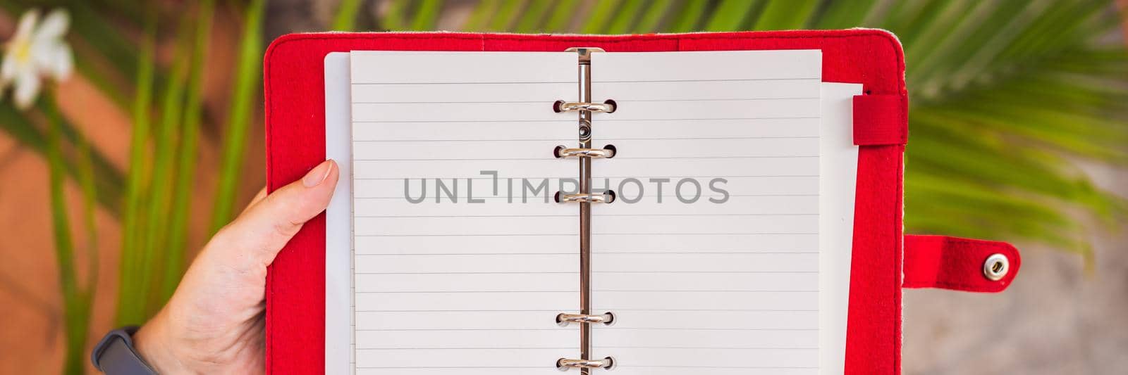 Notepad and stationery on wooden background. Planner for business and study. Fans of stationery BANNER, LONG FORMAT by galitskaya