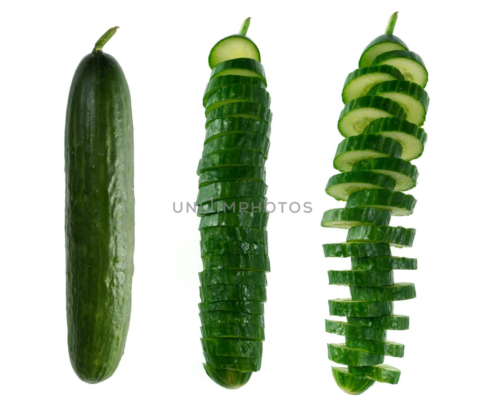 Fresh cucumber covered with chunks, on white background isolated