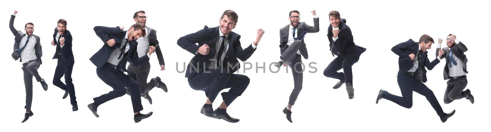 in full growth. two cheerful dancing business people. isolated on white background.