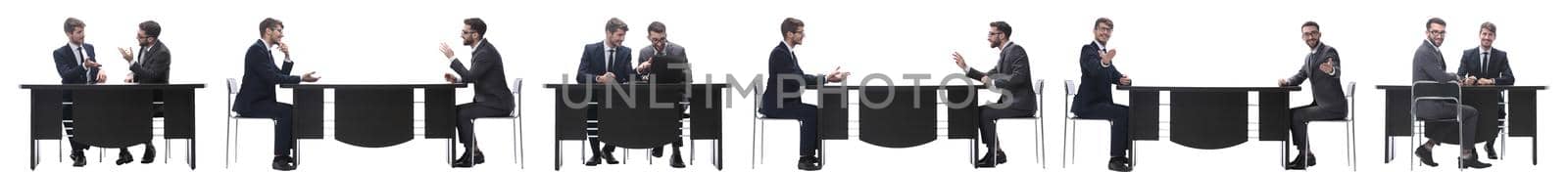 business colleagues discussing that the sitting at the table . isolated on white