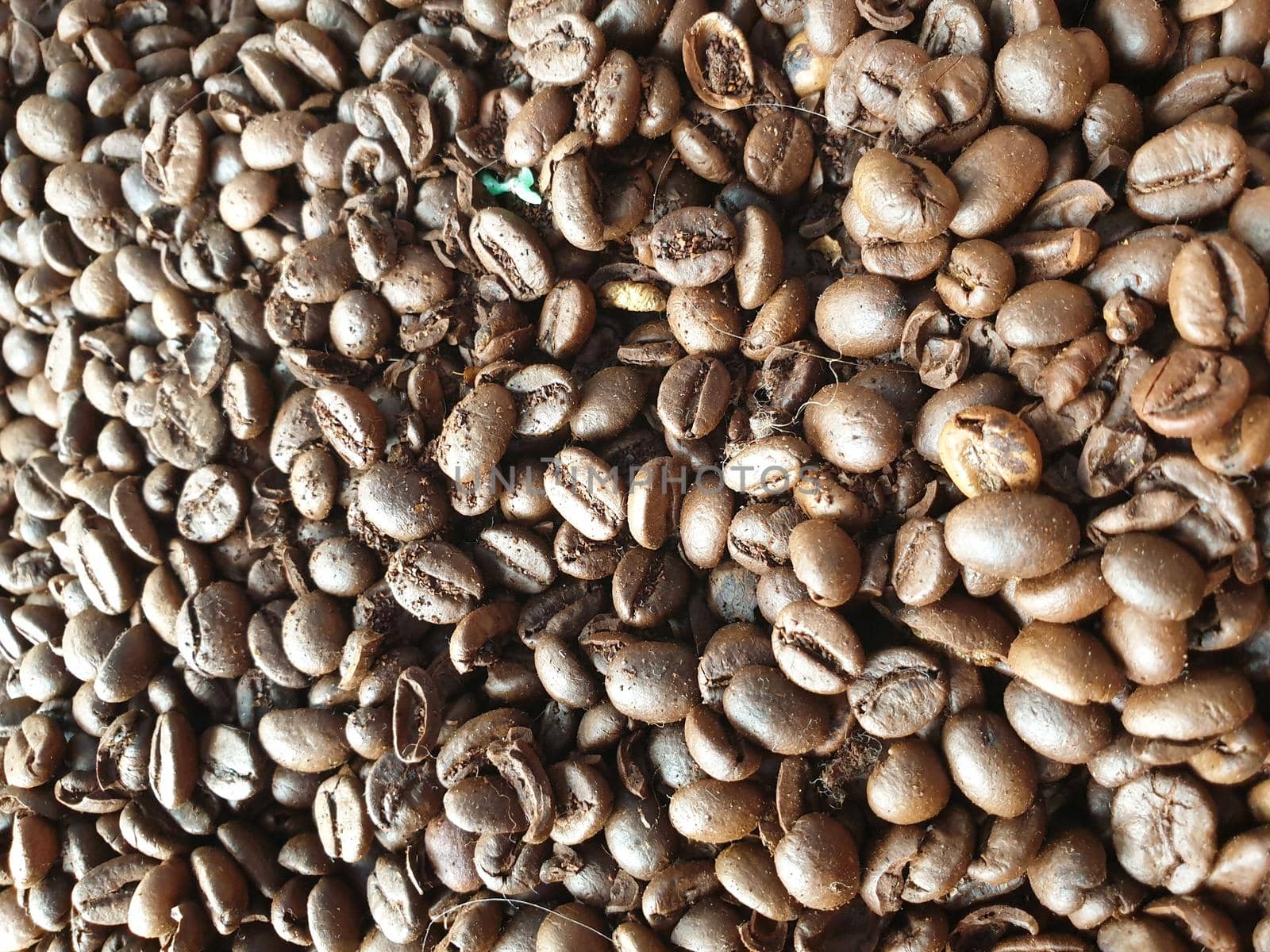 Close-up of roasted and aromatic coffee beans by barcielaphoto