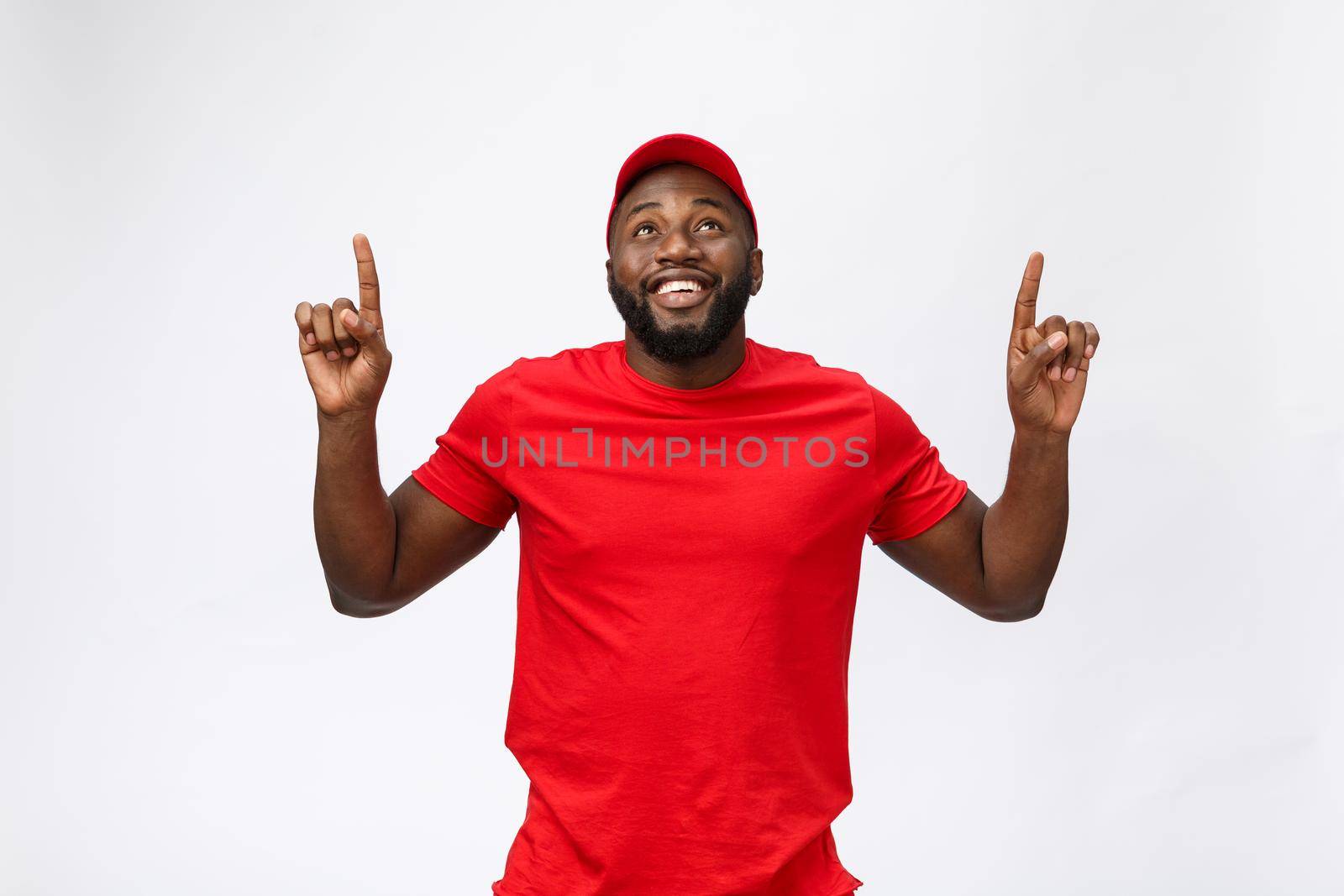 African american man over isolated background surprised with an idea or question pointing finger with surprise face