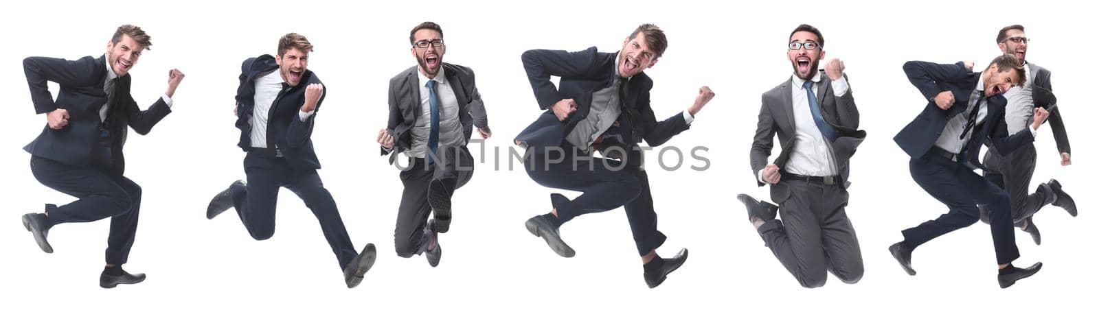 in full growth. two cheerful dancing business people. isolated on white background.