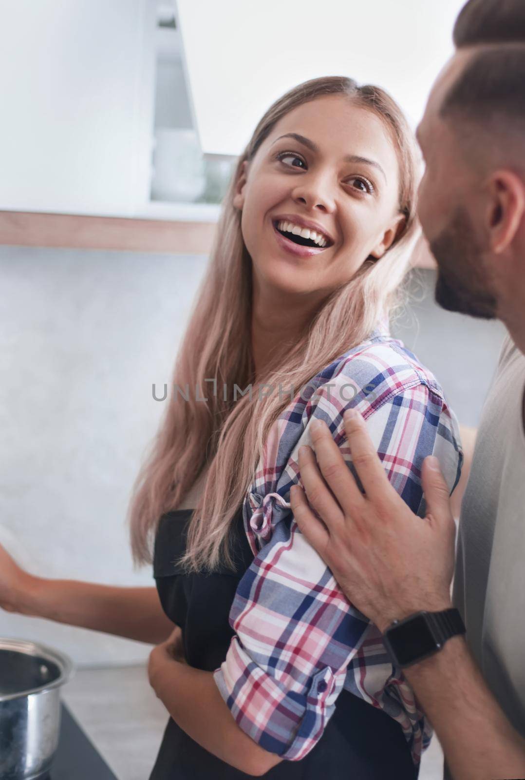 close up. happy young couple preparing dinner together