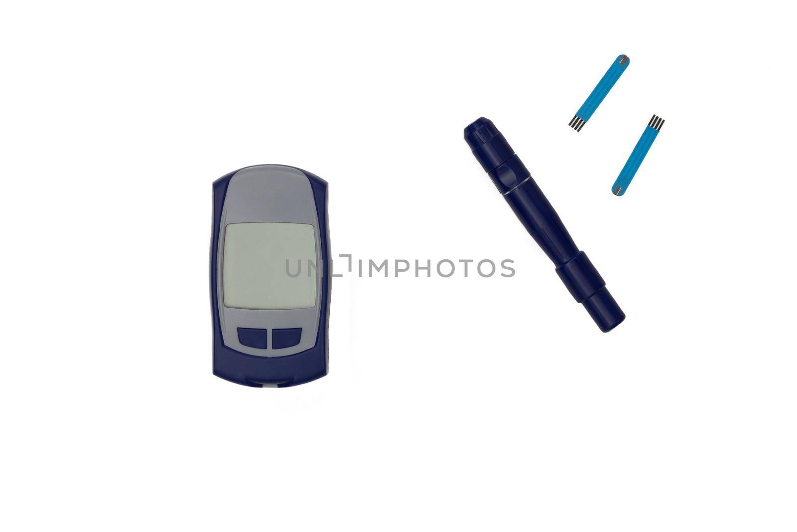 Top view of isolated glucometer lancet and test strips on white background