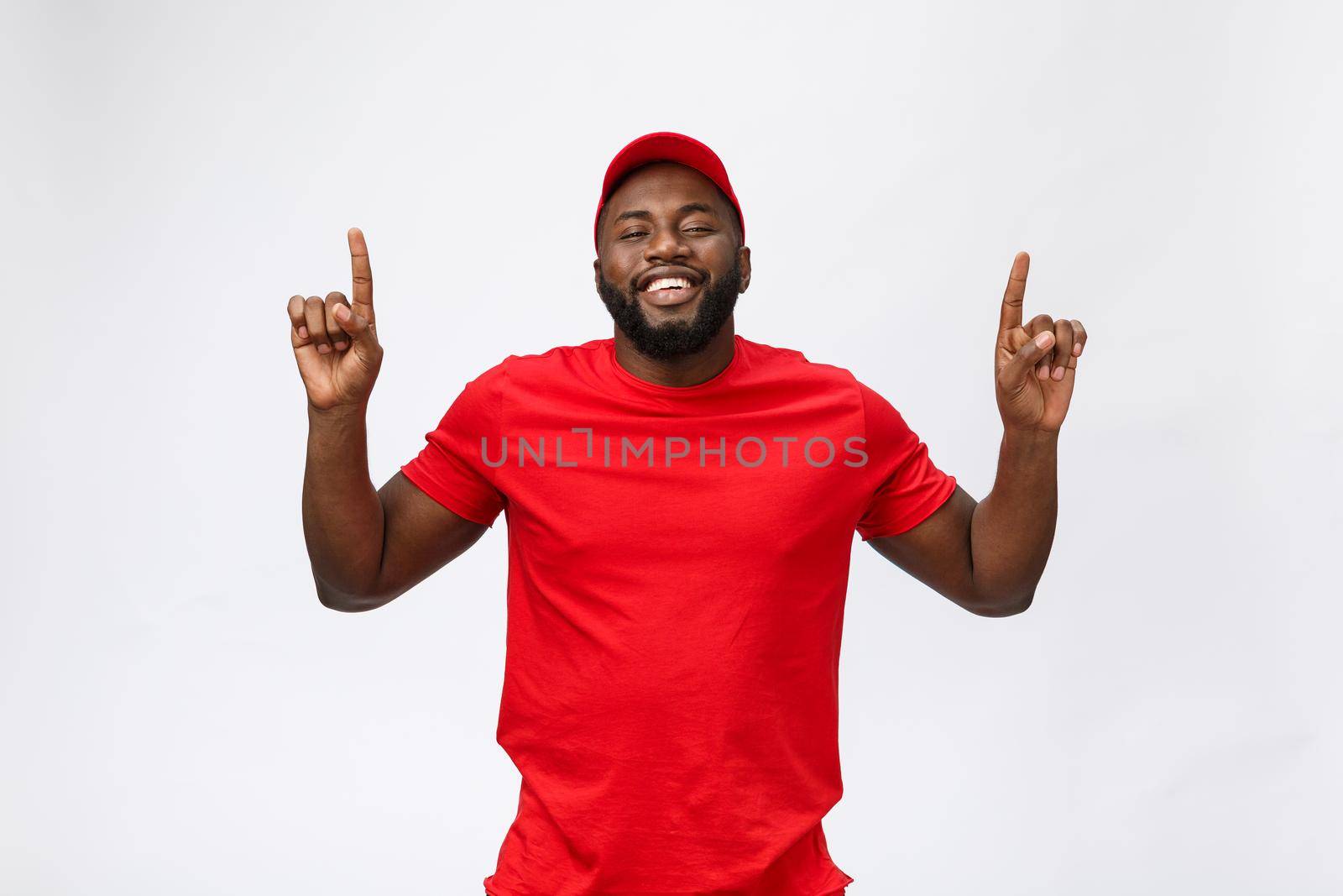African american man over isolated background surprised with an idea or question pointing finger with surprise face