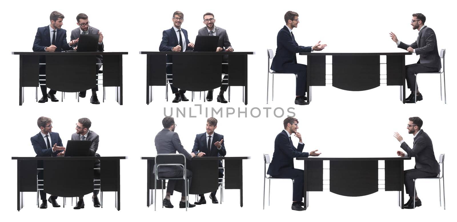 top view. two business people sitting at the Desk. isolated on white background