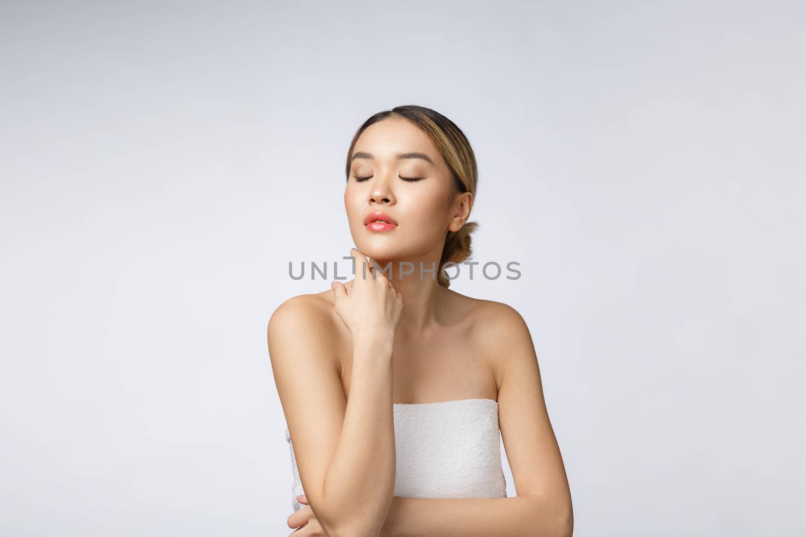 Portrait of beautiful asian woman makeup of cosmetic, girl hand touch cheek,face of beauty perfect with wellness isolated on white background.