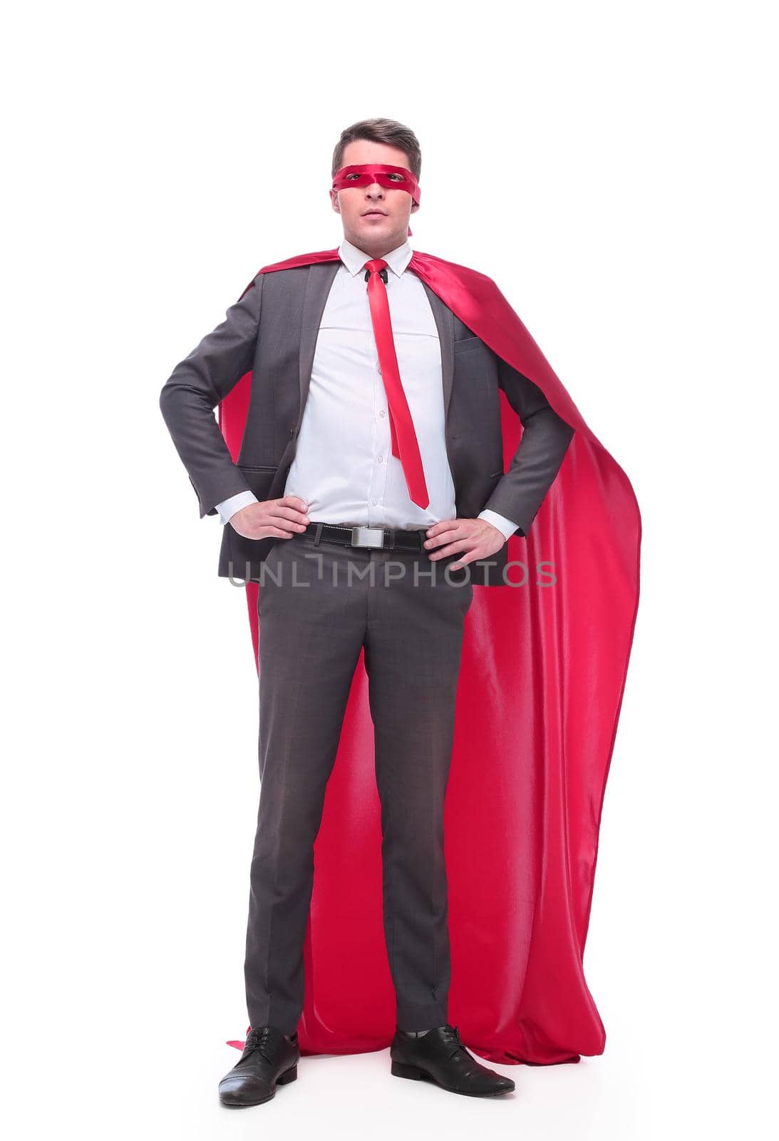in full growth. responsible superhero businessman looking forward . isolated on white