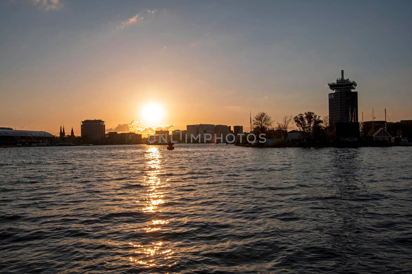 Harbor from Amsterdam in the Netherlands at sunset