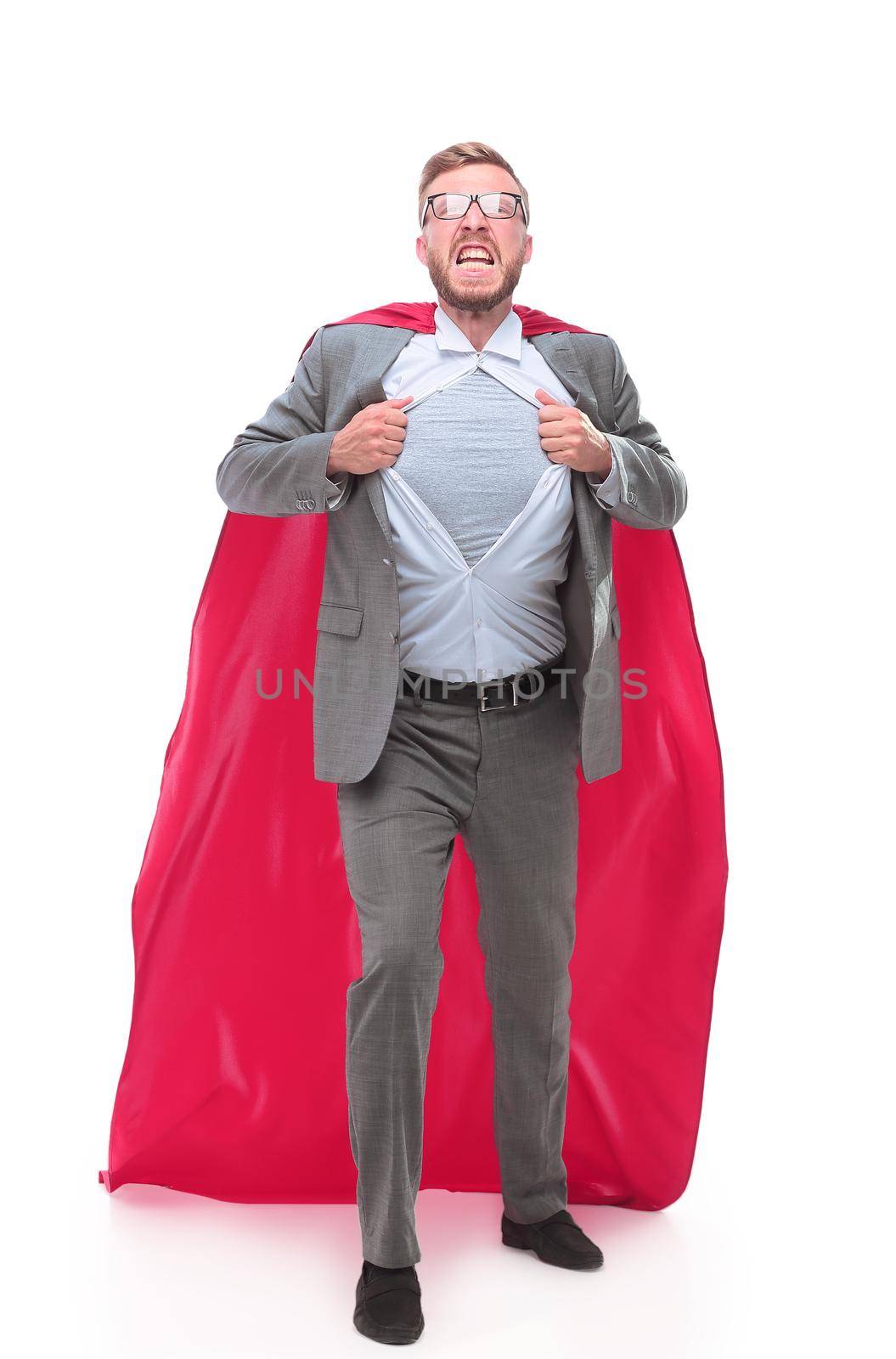 in full growth. businessman in superhero Cape rips his shirt. by asdf