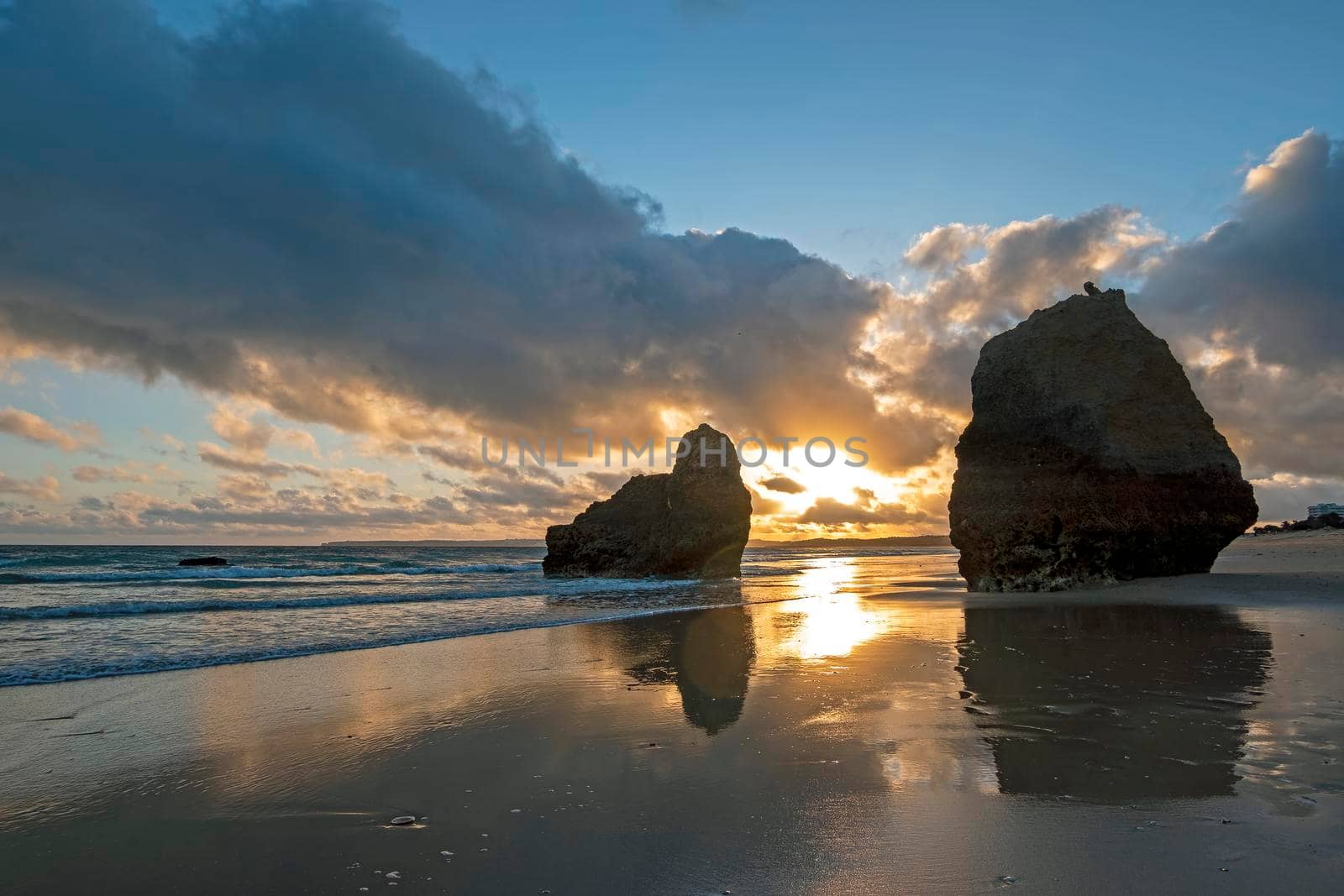 Natural rocks at praia Tres Irmaos in Alvor the Algarve Portugal at sunset by devy