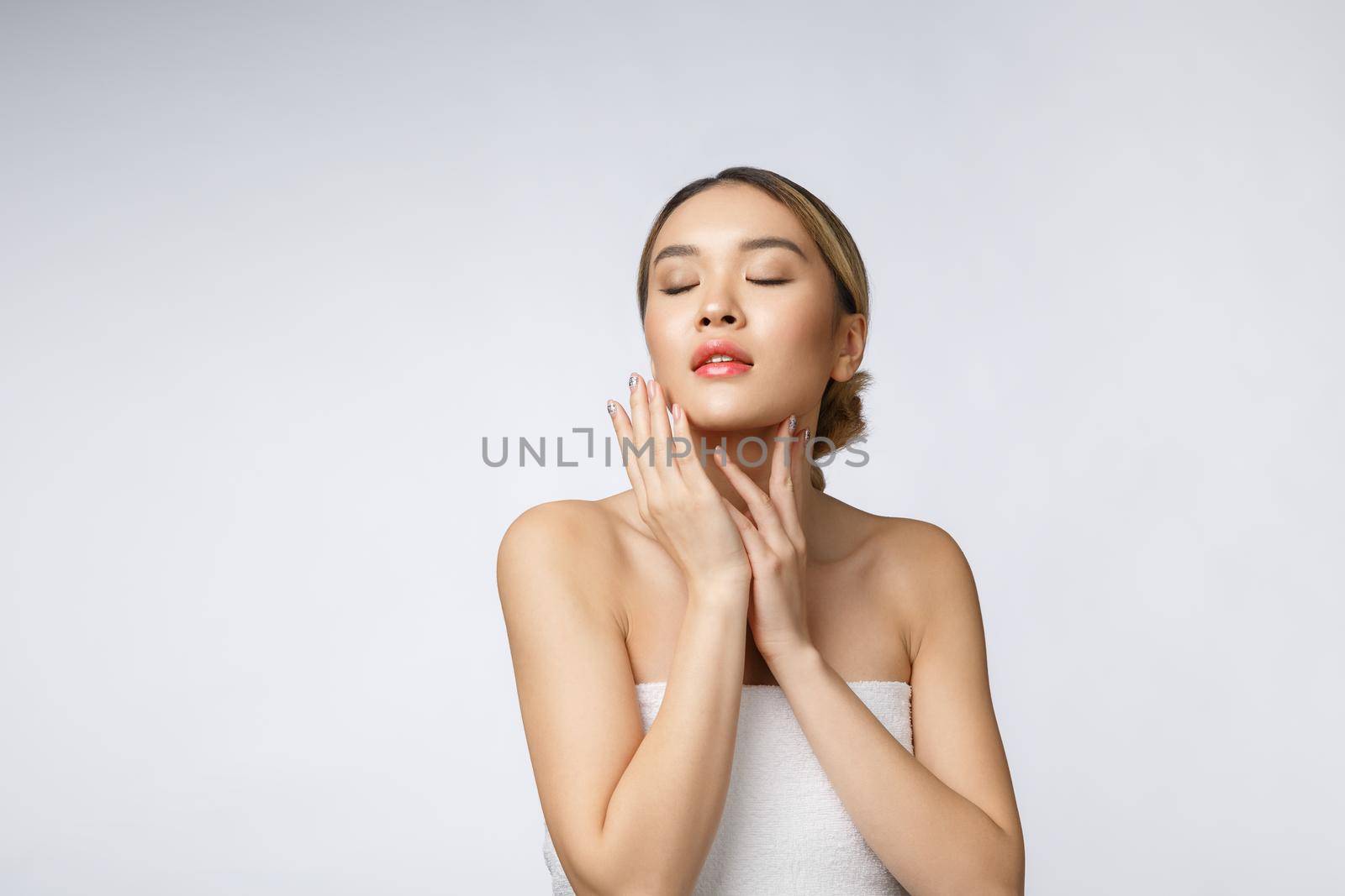 Portrait of beautiful asian woman makeup of cosmetic, girl hand touch cheek,face of beauty perfect with wellness isolated on white background.