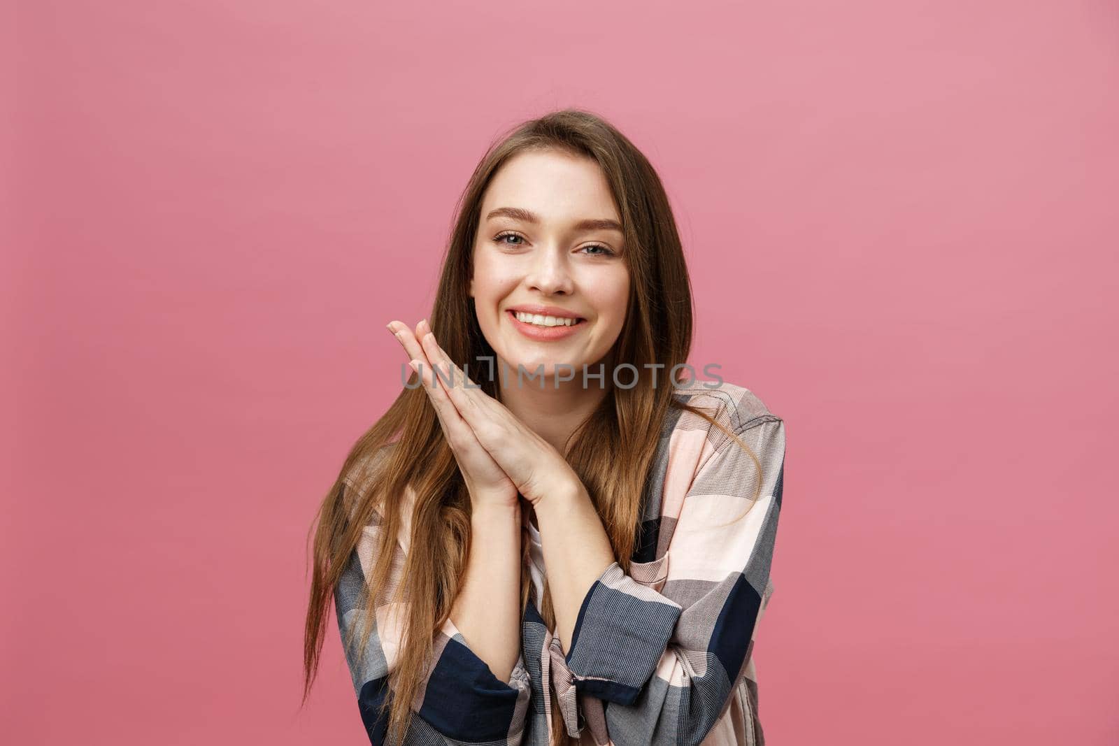 Portrait of beautiful brunette caucasian woman in pink studio by Benzoix