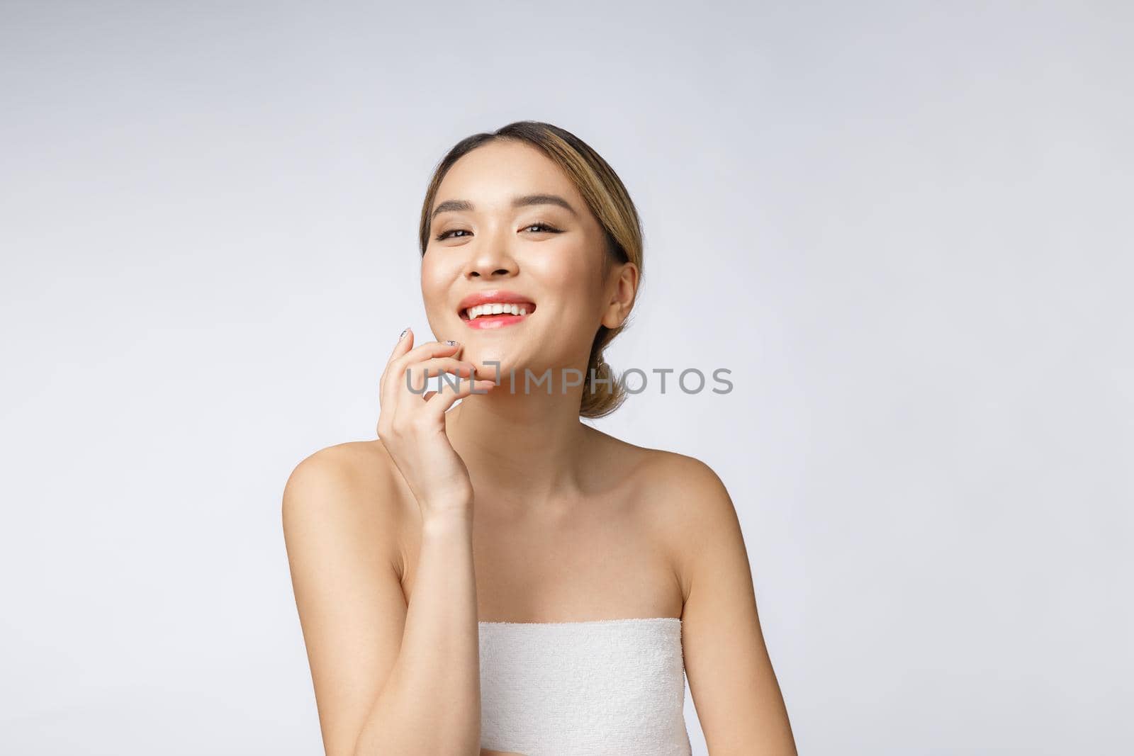 Beautiful Charming Asian young woman smile with white teeth, feeling so happiness and cheerful with healthy skin,isolated on white background.