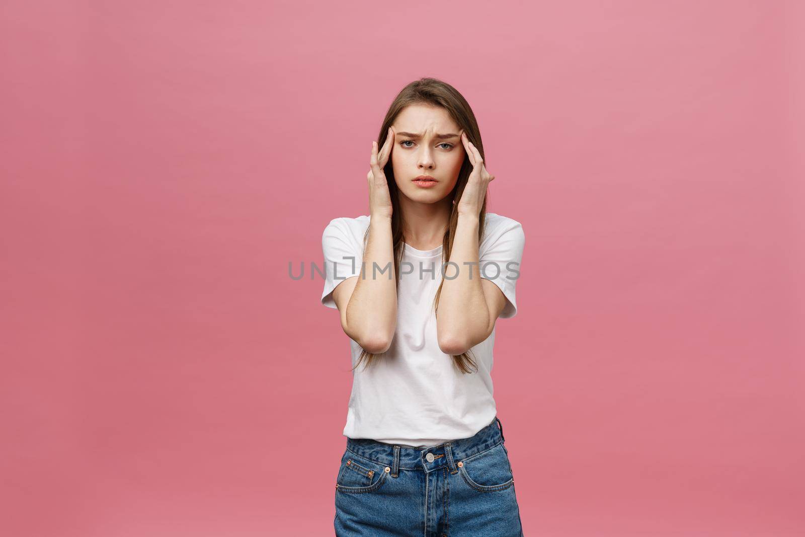 girl suffers from terrible headaches and compresses the head with fingers. Forget and remember something, suffer from illness.