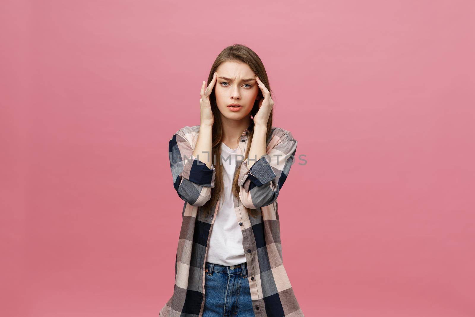 girl suffers from terrible headaches and compresses the head with fingers. Forget and remember something, suffer from illness.