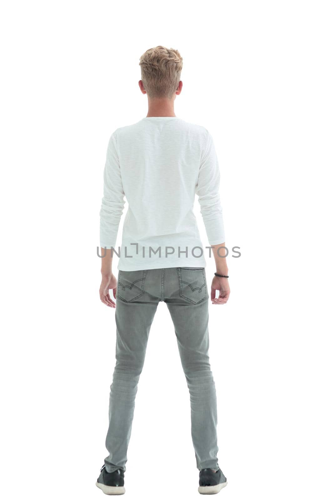 rear view. random man with glasses looking standing in front of white wall . isolated on white