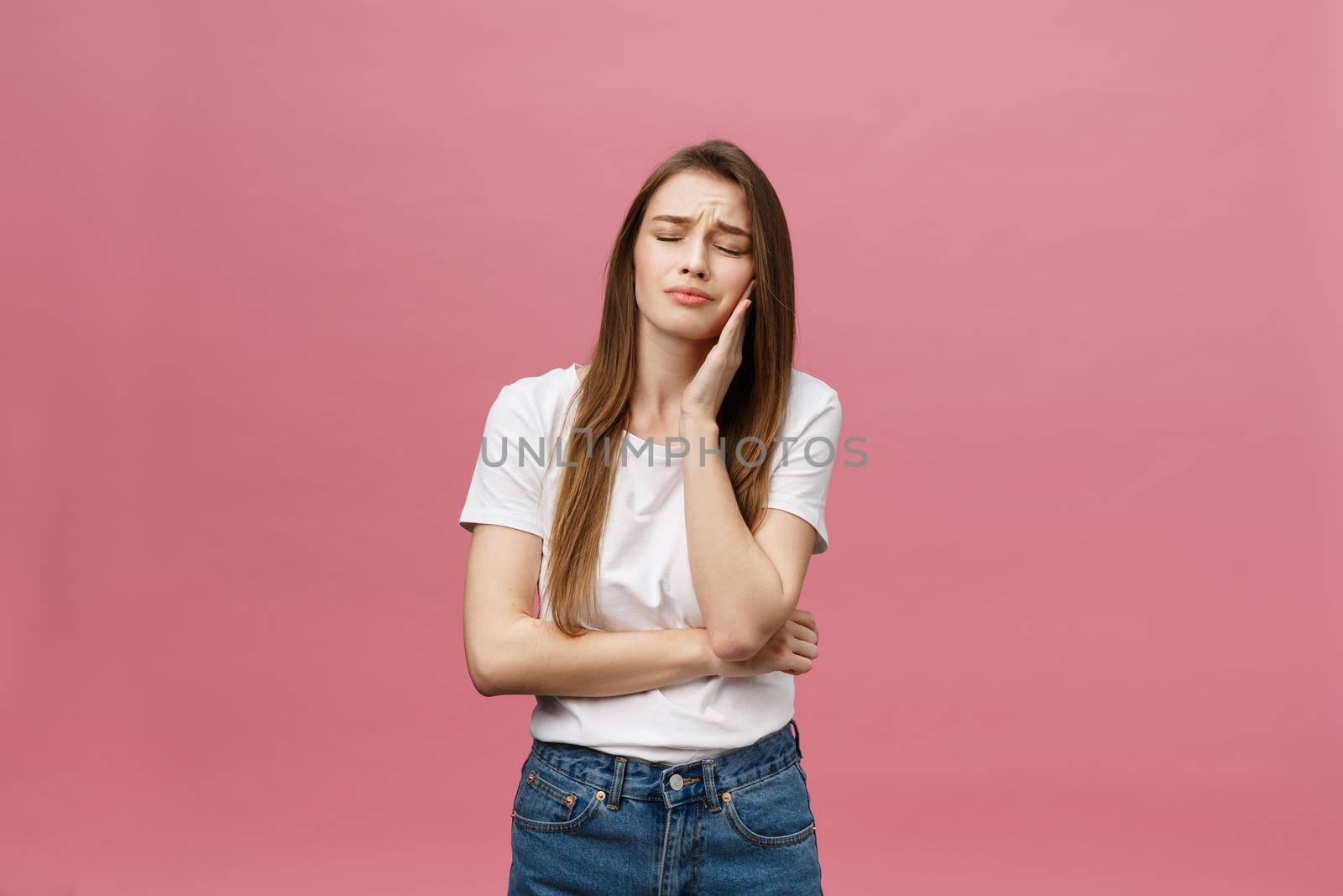 Young caucasian woman over isolated background touching mouth with hand with painful expression because of toothache. Dentist concept by Benzoix