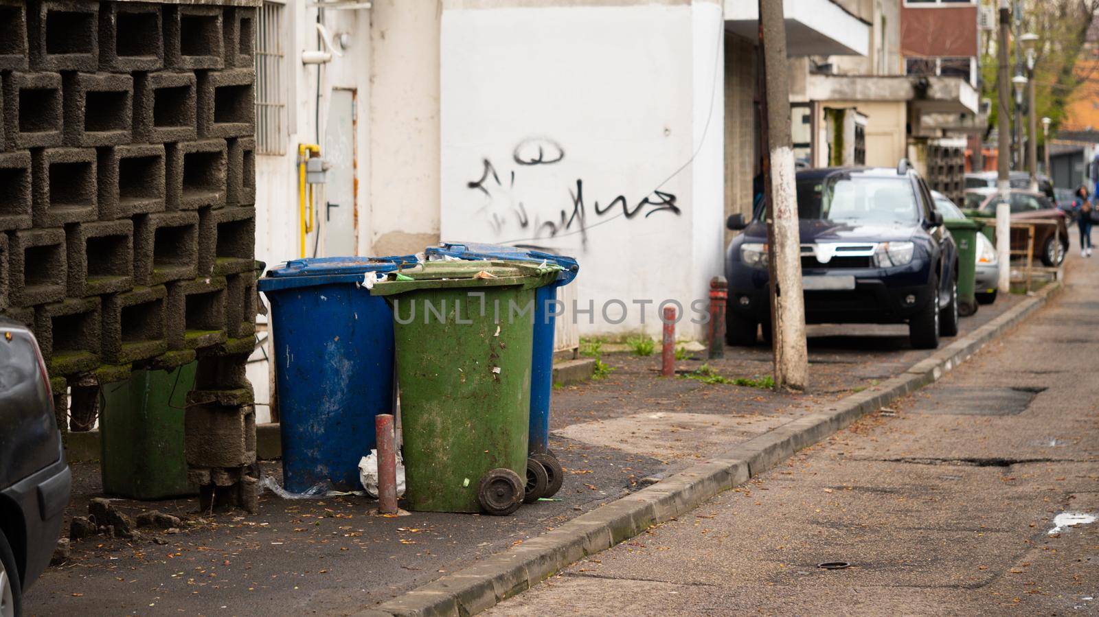 Barbage bins for food wastetight, outdoor with sunlight background.