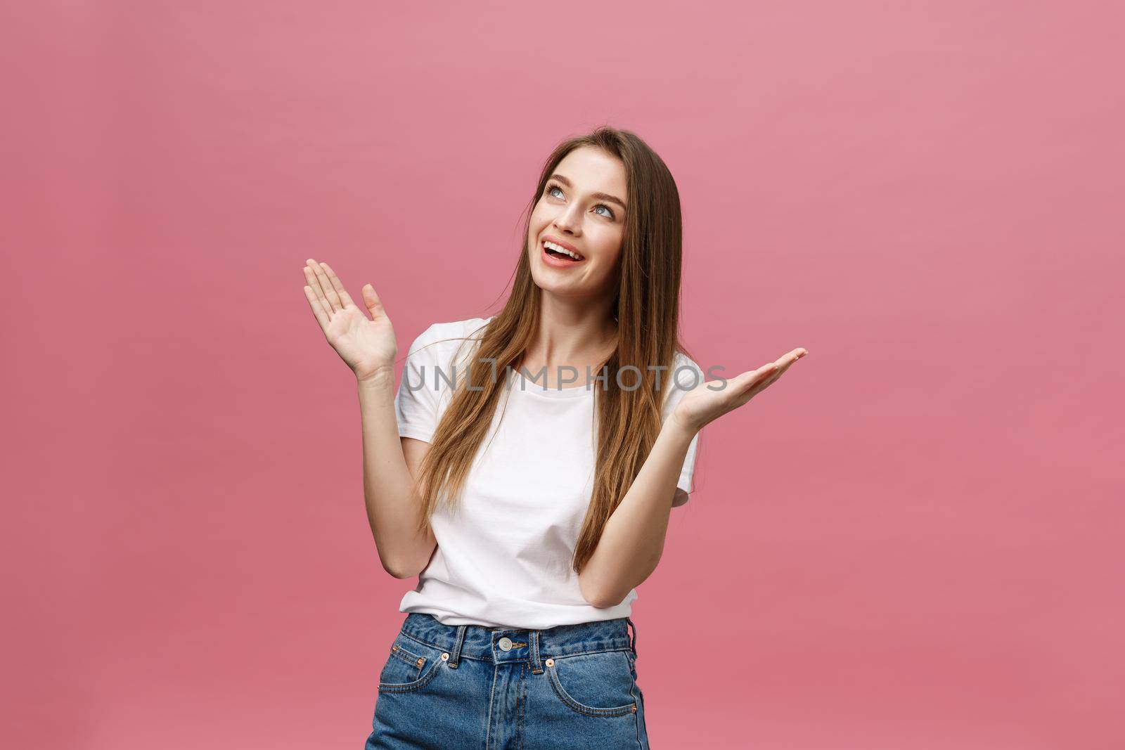 Portrait of crazy adorable young woman playing with her hairs. emotional girl isolated on white background by Benzoix