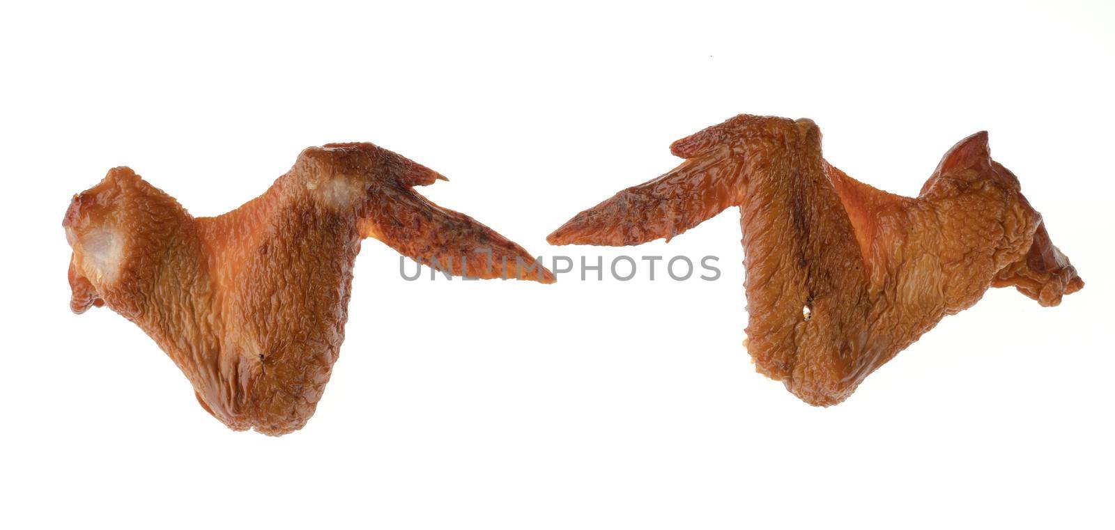 Smoked chicken wings on a white background in isolation