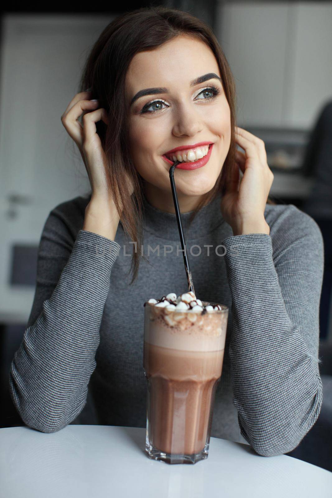 Smiling Woman with Coffee Frappe Drink at the Restaurant - Portrait of a beautiful girl with frappuccino