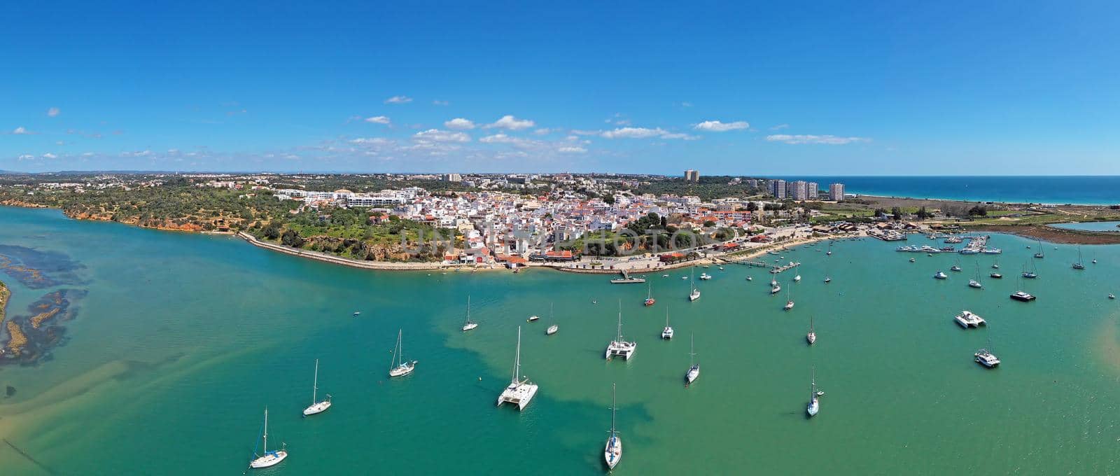 Aerial panorama from the village and harbor in Alvor in the Algarve Portugal by devy