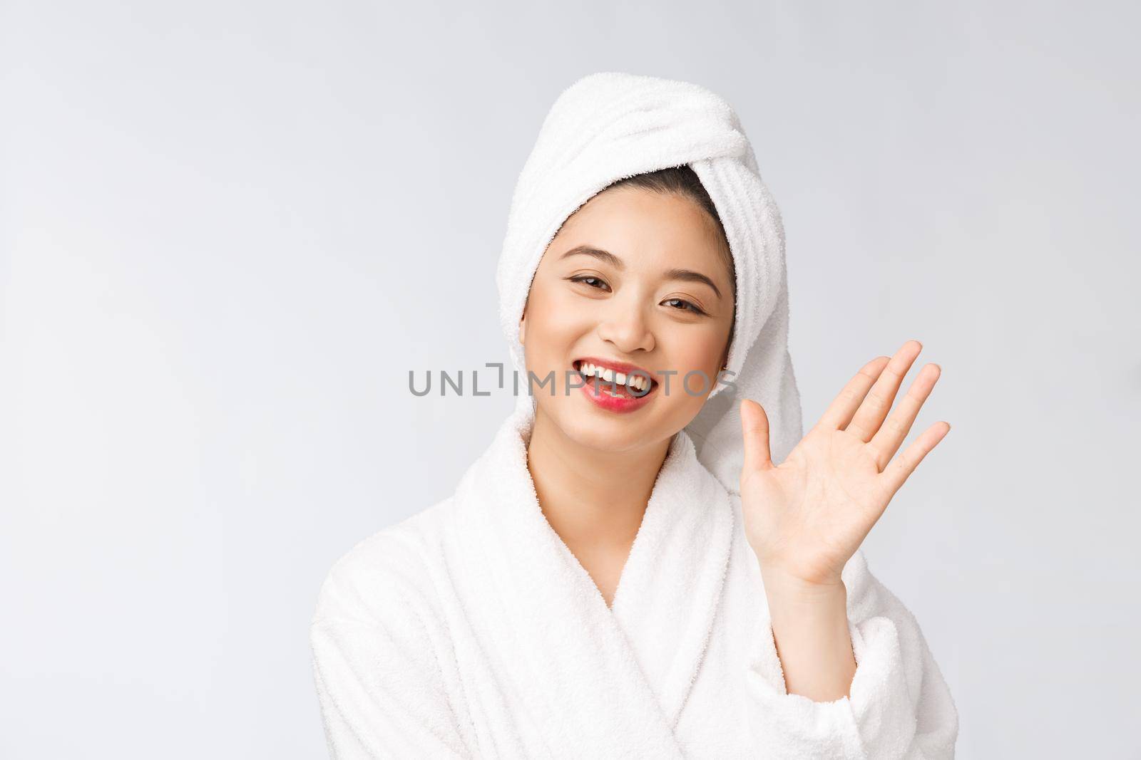 Spa skincare beauty Asian woman drying hair with towel on head after shower treatment. Beautiful multiracial young girl touching soft skin by Benzoix