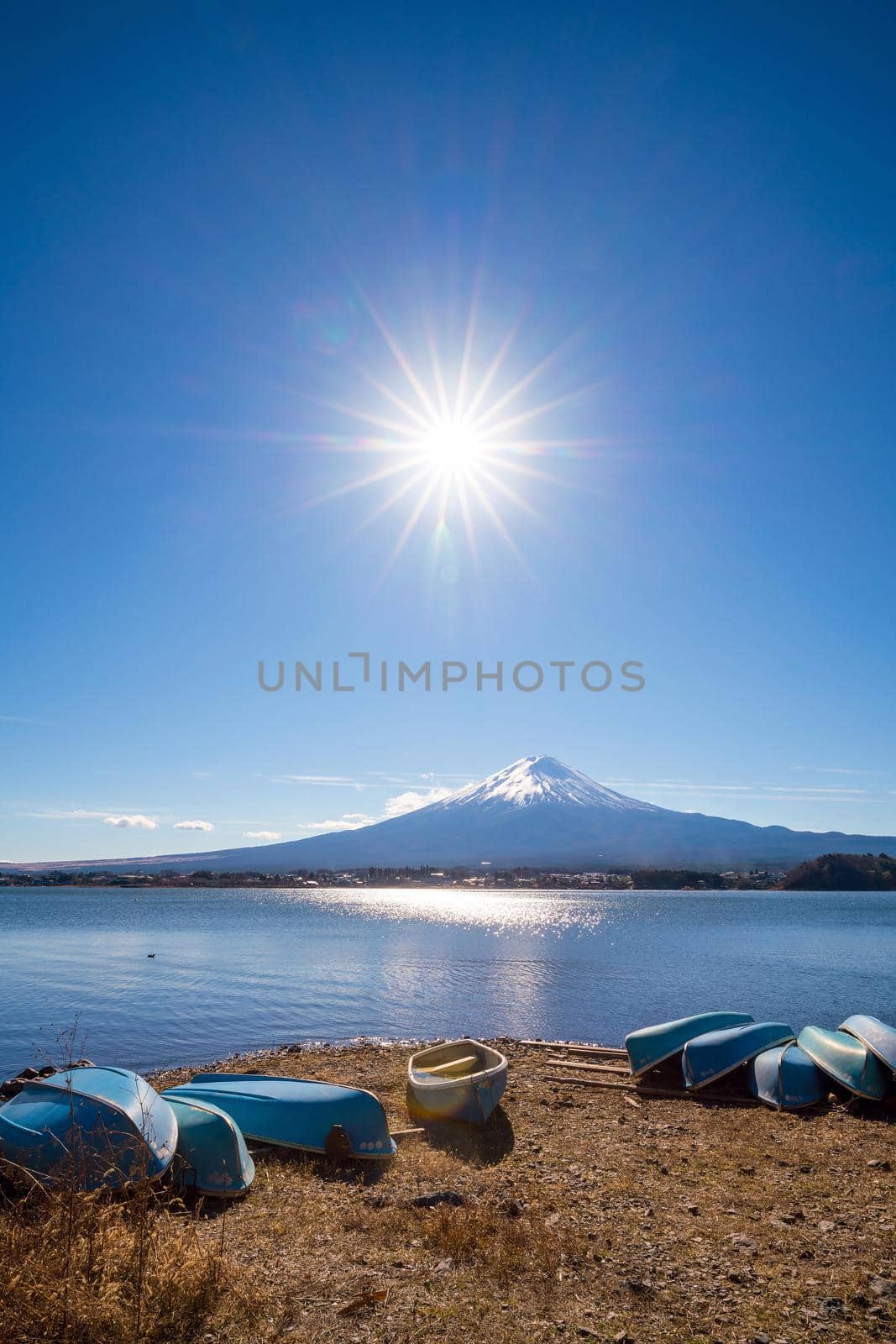 Sun star effect shot with Mountain Fuji and boats  by f11photo