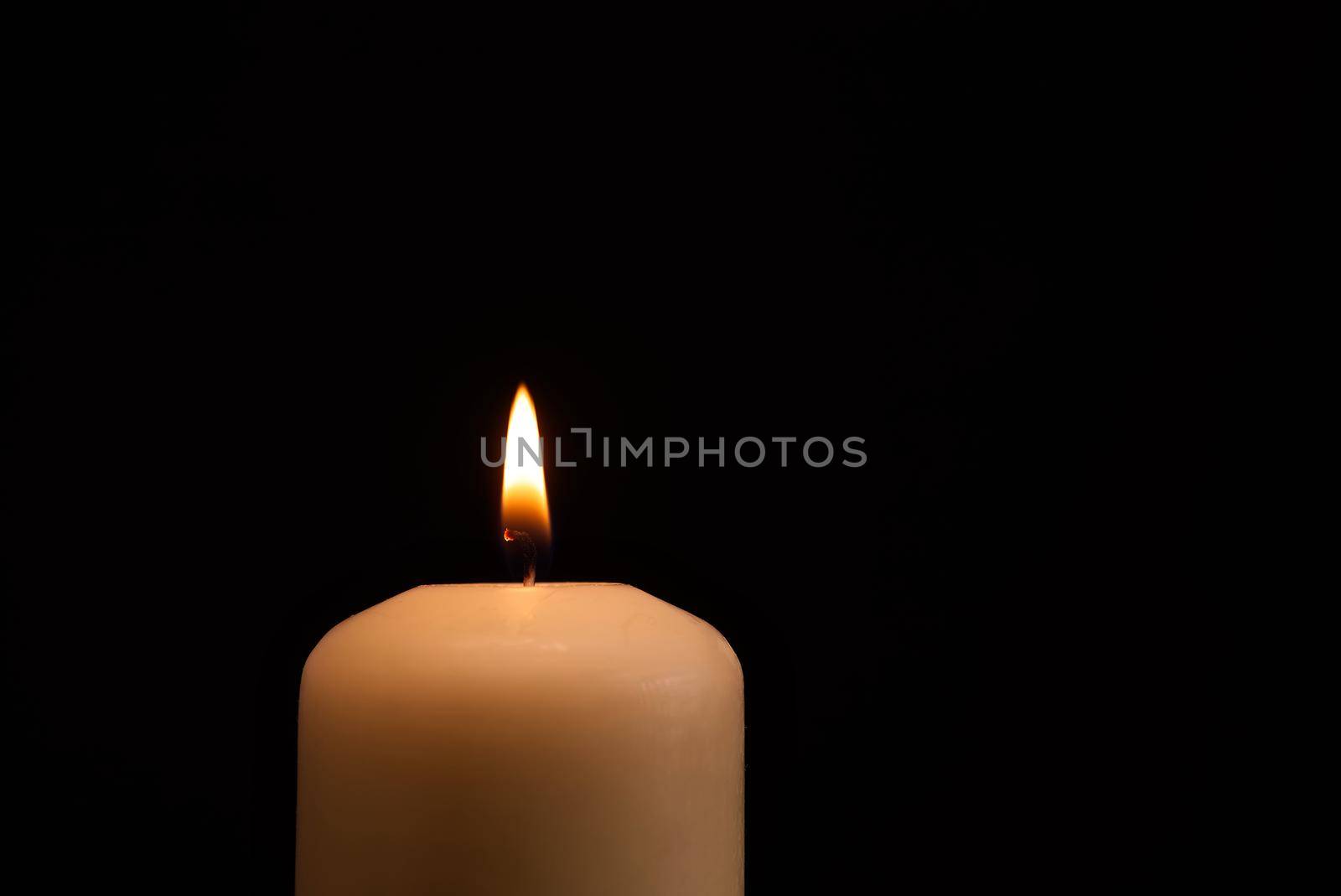 Candle flame in the darkness by NetPix